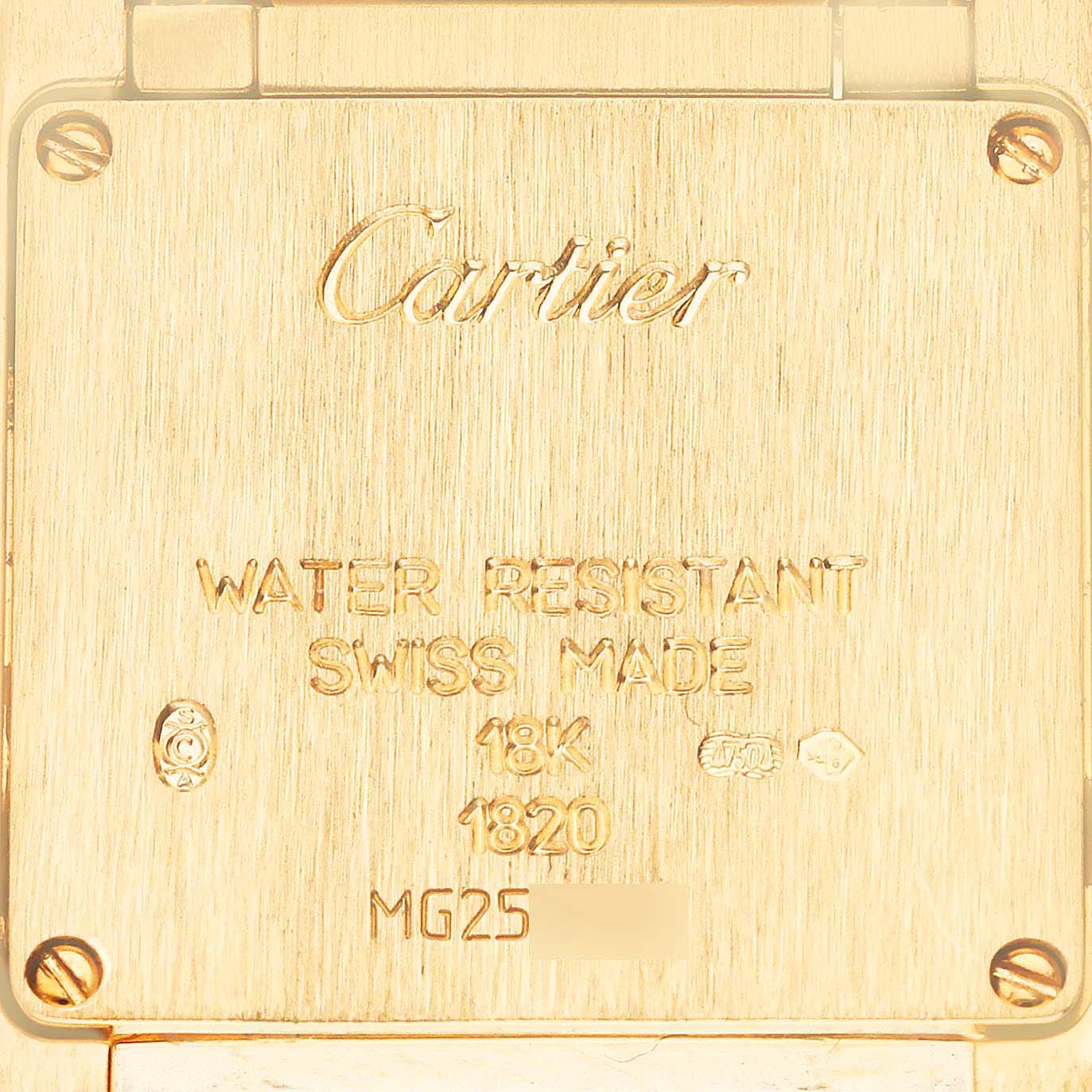 The image shows the back plate of the Cartier Tank Francaise W50002N2 Women's Yellow Gold White Dial W50002N2 Women's Yellow Gold White Dial watch, displaying engravings like "Cartier" and "18K."