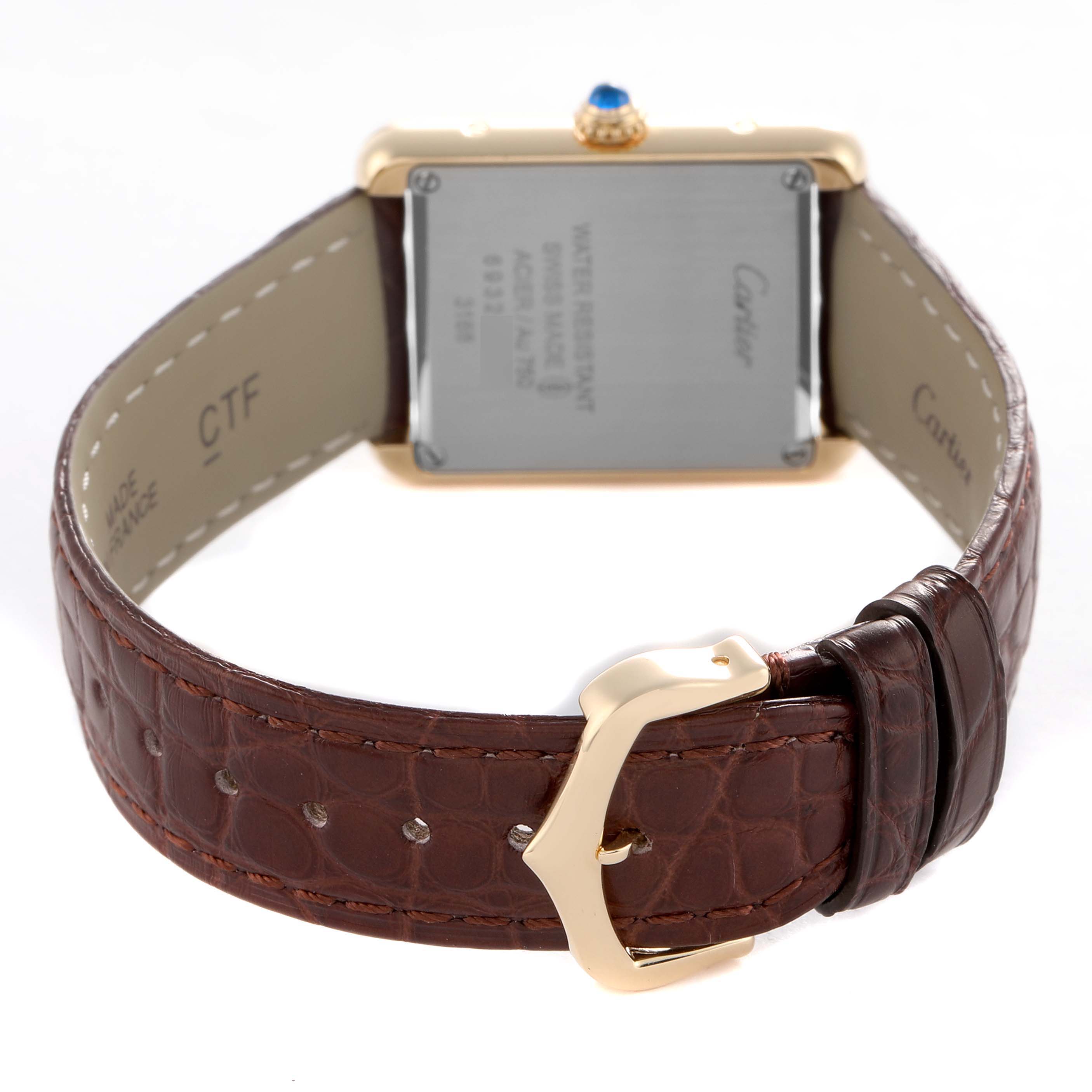 The image shows the back view of a Cartier Tank Solo W5200024 Women's Rose Gold Silver Dial watch, focusing on the leather strap and case back.