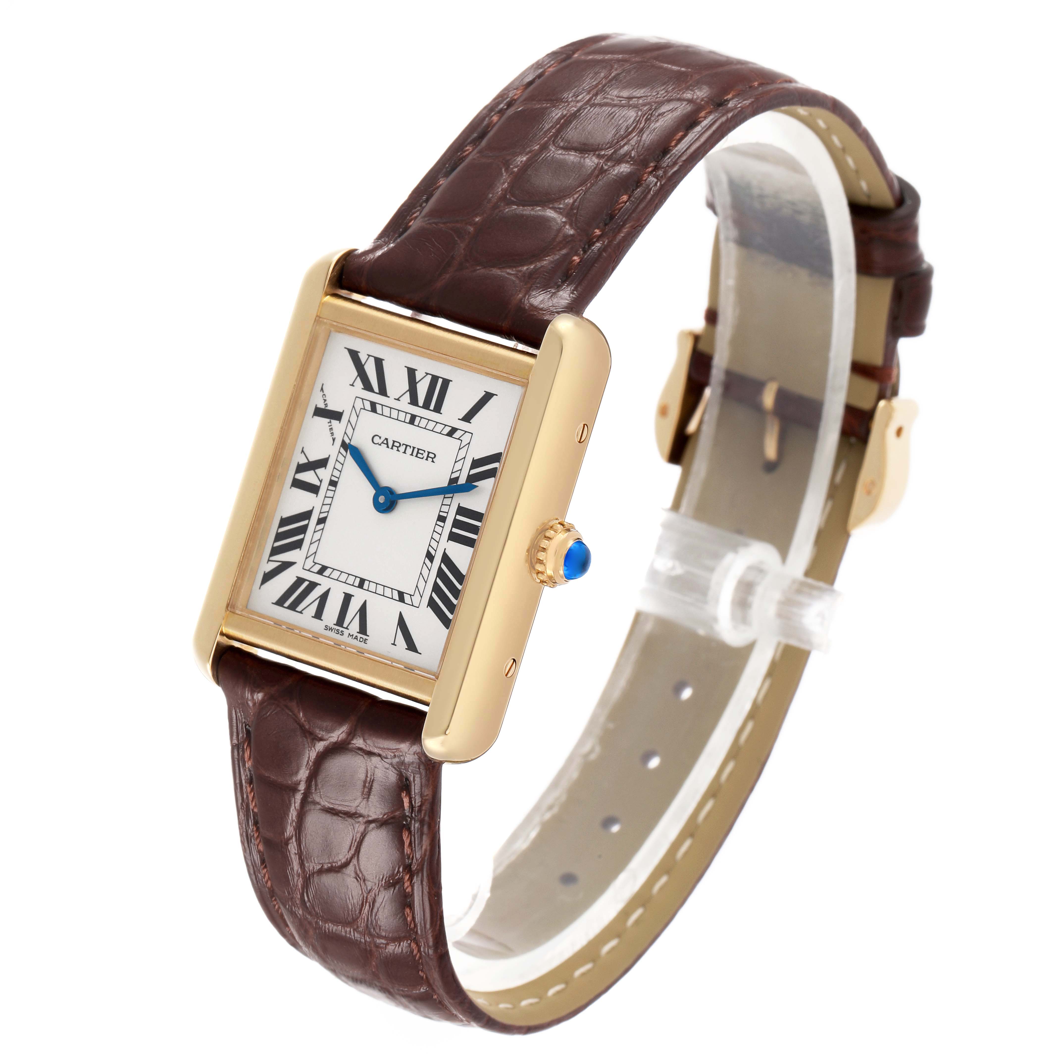The Cartier Tank Solo W5200024 Women's Rose Gold Silver Dial watch is shown at a three-quarter angle, highlighting its rectangular face, Roman numerals, gold casing, and brown leather strap.