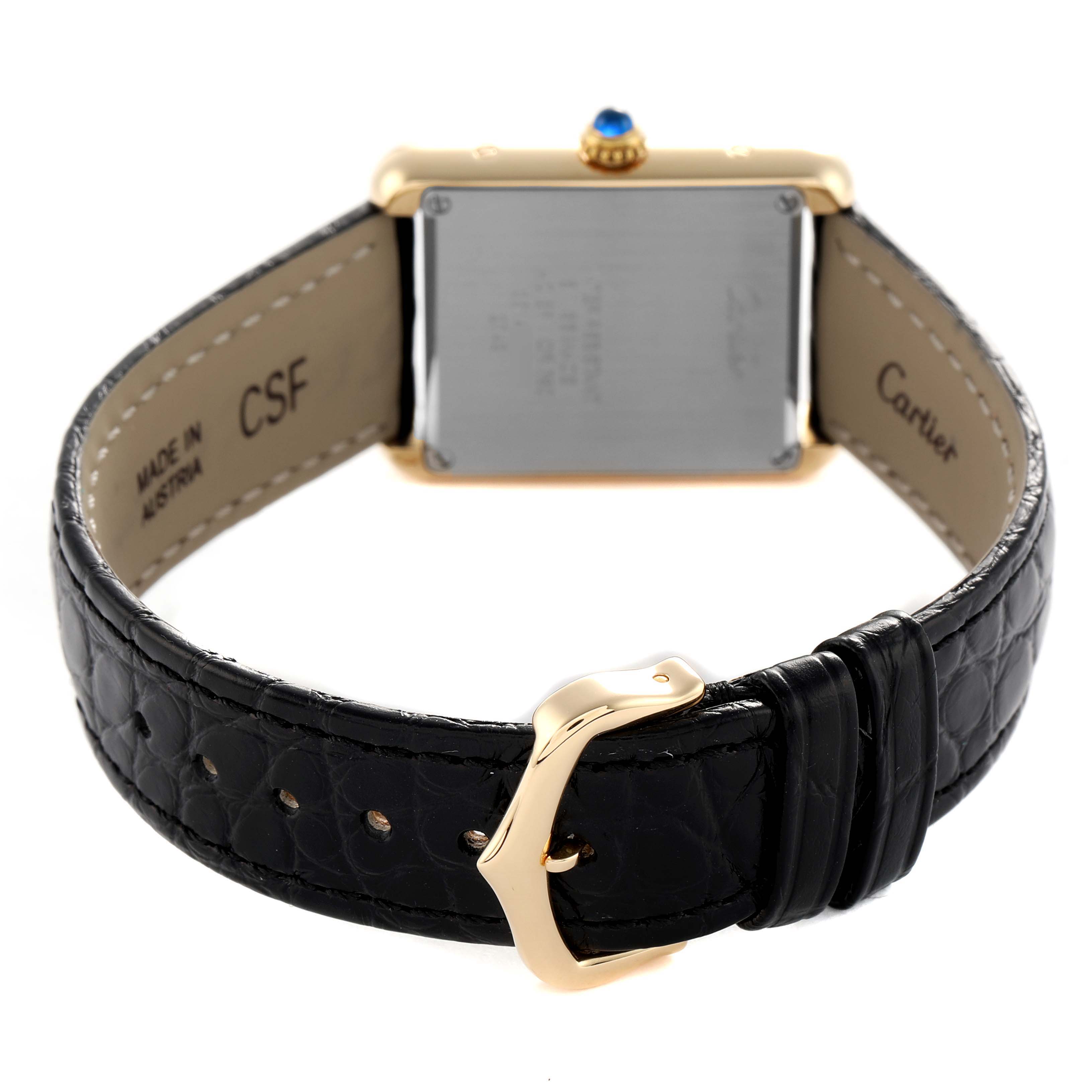 The Cartier Tank Solo W1018755 Women's Yellow Gold Silver Dial watch is shown from the back, highlighting the buckle, strap, and case back.