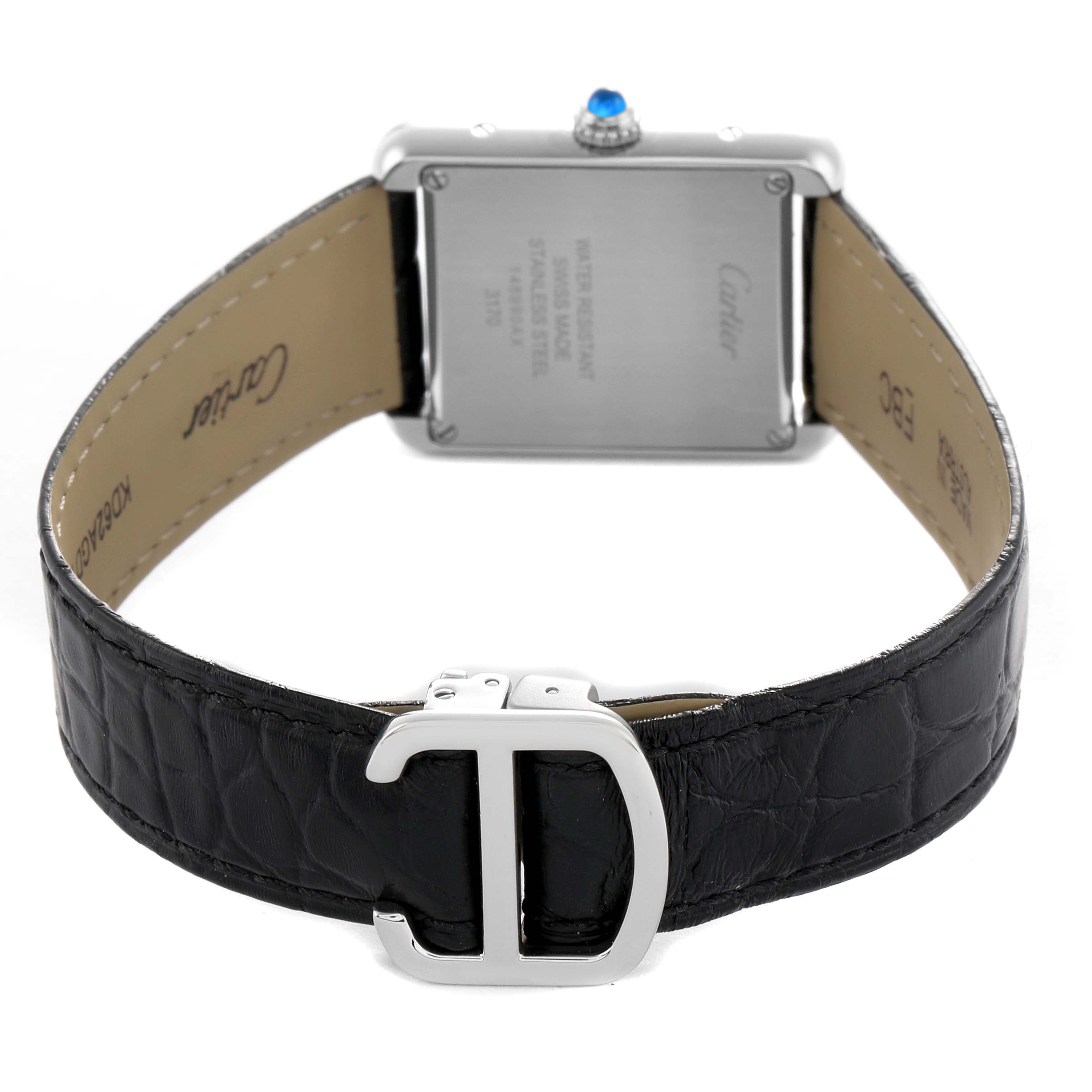 The Cartier Tank Solo WSTA0030 Women's Stainless Steel Silver Dial watch is shown from the back, highlighting the buckle and case back details.