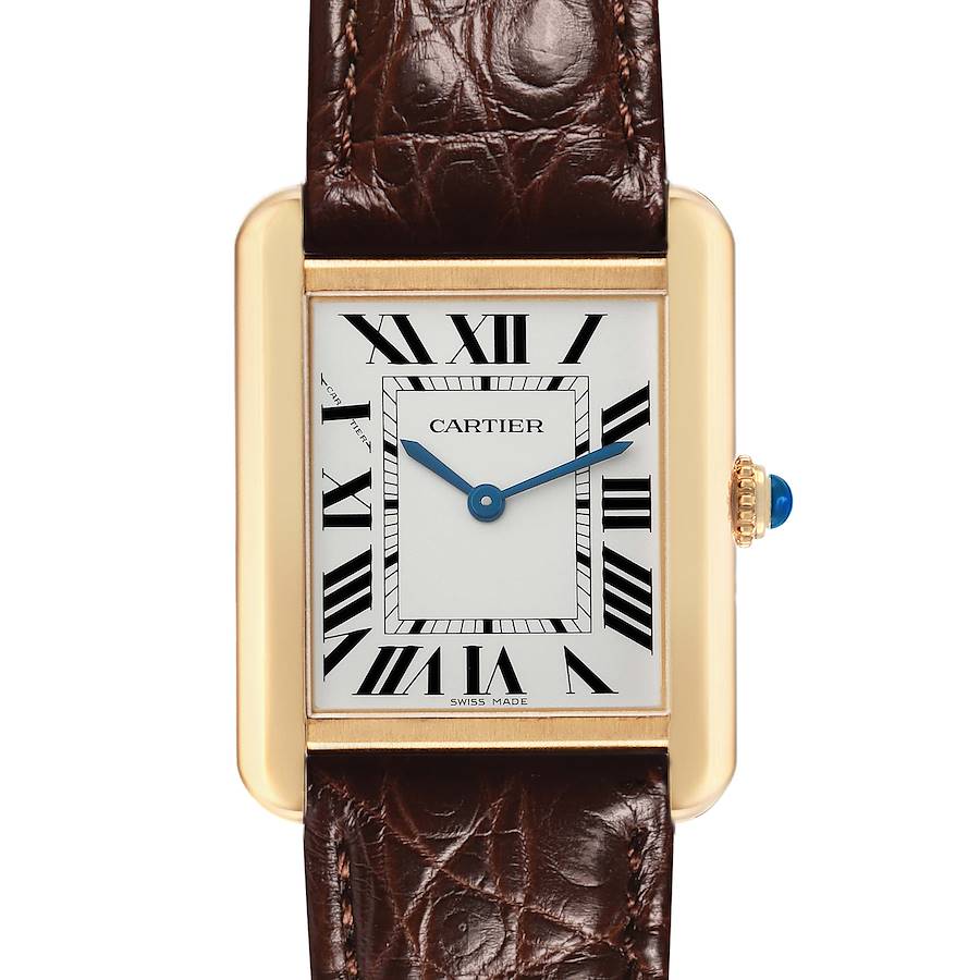 The Cartier Tank Solo W5200002 Women's Yellow Gold Silver Dial watch is shown from a front view, highlighting its rectangular face, leather strap, and crown with a blue cabochon.