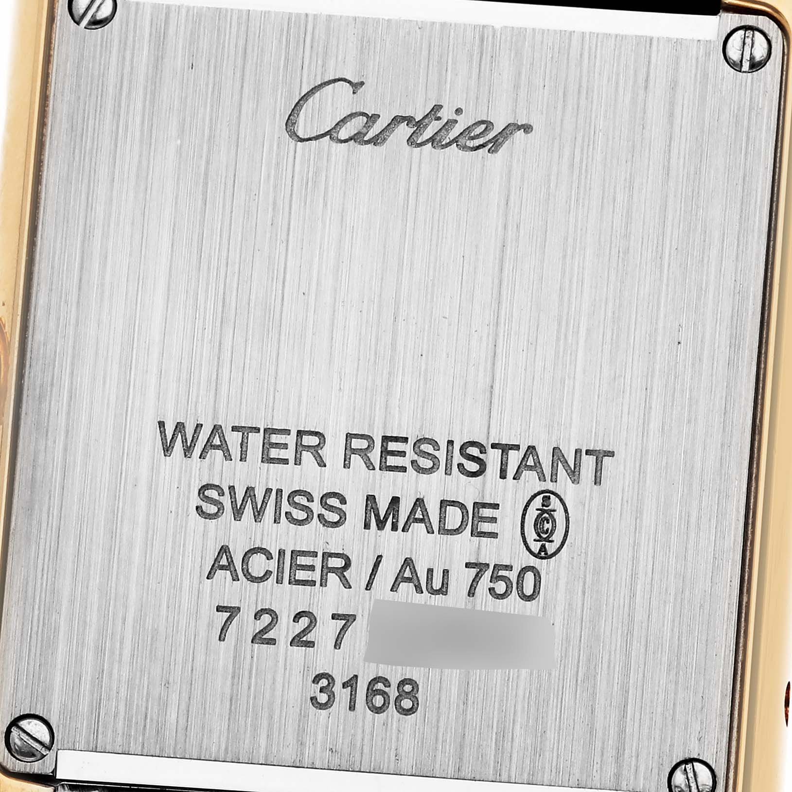 The image shows the back case of a Cartier Tank Solo W5200002 Women's Steel and Gold (two tone) Silver Dial W5200002 Women's Steel and Gold (two tone) Silver Dial watch, engraved with model details and specifications.