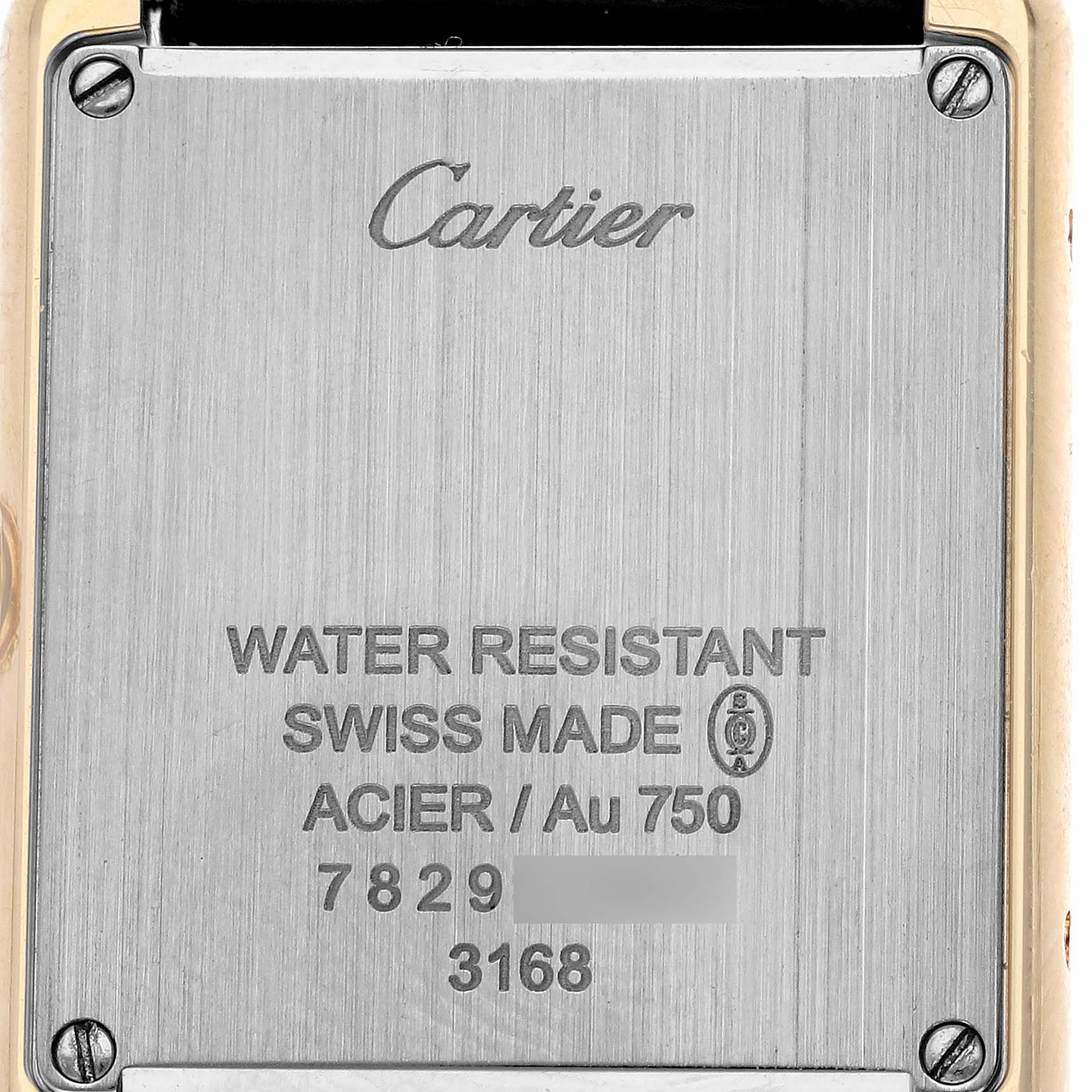 The image shows the back of the Cartier Tank Solo W5200002 Women's Steel and Gold (two tone) Silver Dial W5200002 Women's Steel and Gold (two tone) Silver Dial watch, highlighting "water resistant" and "Swiss made" engravings.