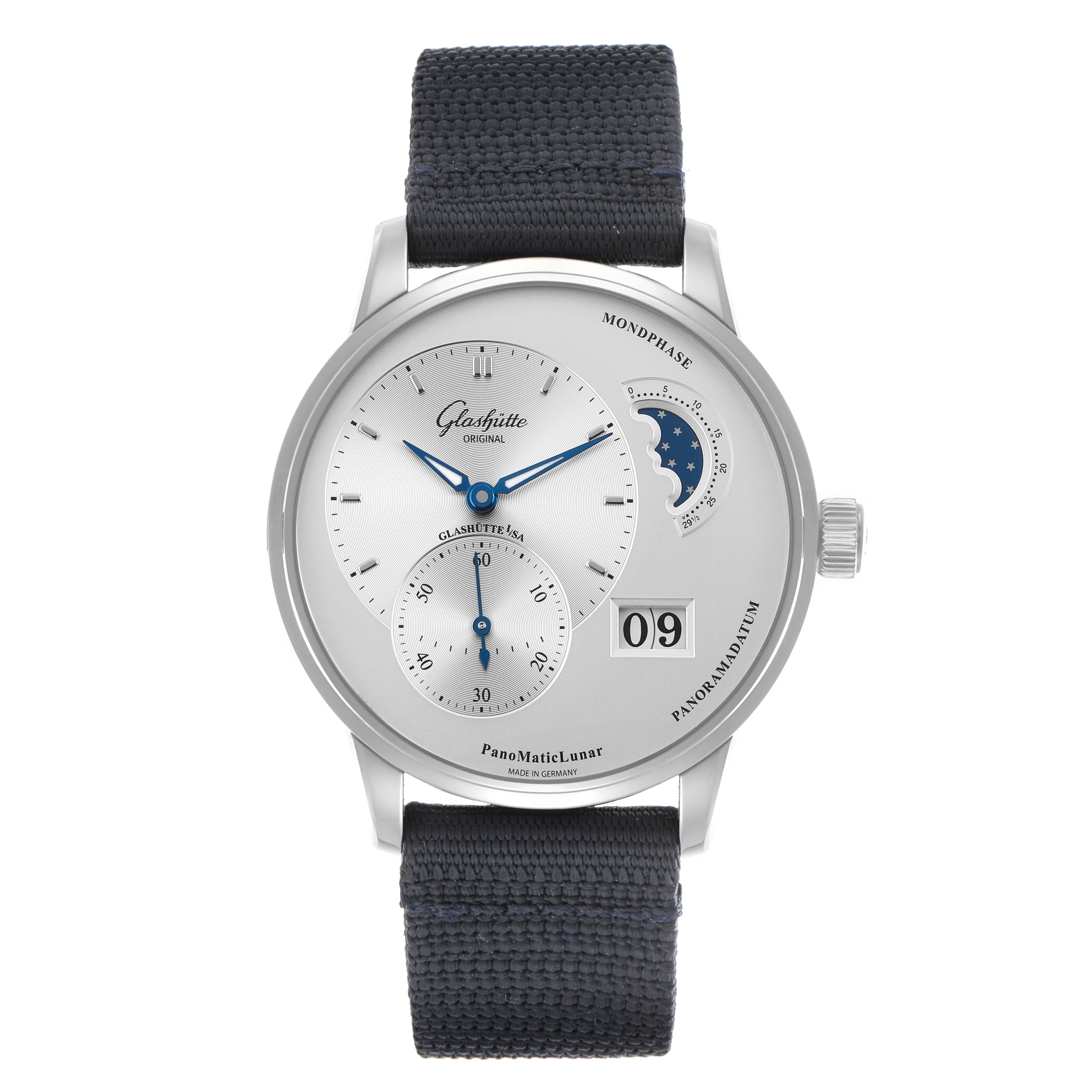 The Glashütte Pano watch is shown from a front angle, displaying the dial, moon phase, date display, and black strap.