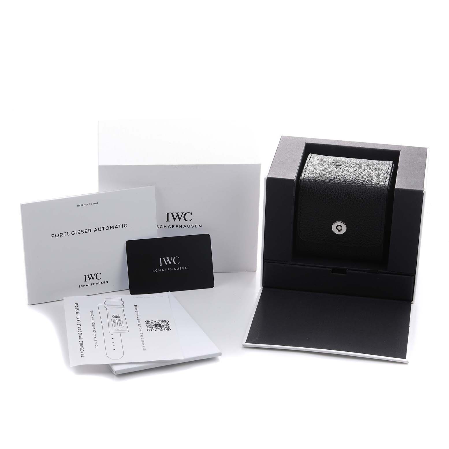The image shows the box, manuals, and warranty card for the IWC Portuguese IW501705 Men's Stainless Steel Beige Dial model from a front angle.