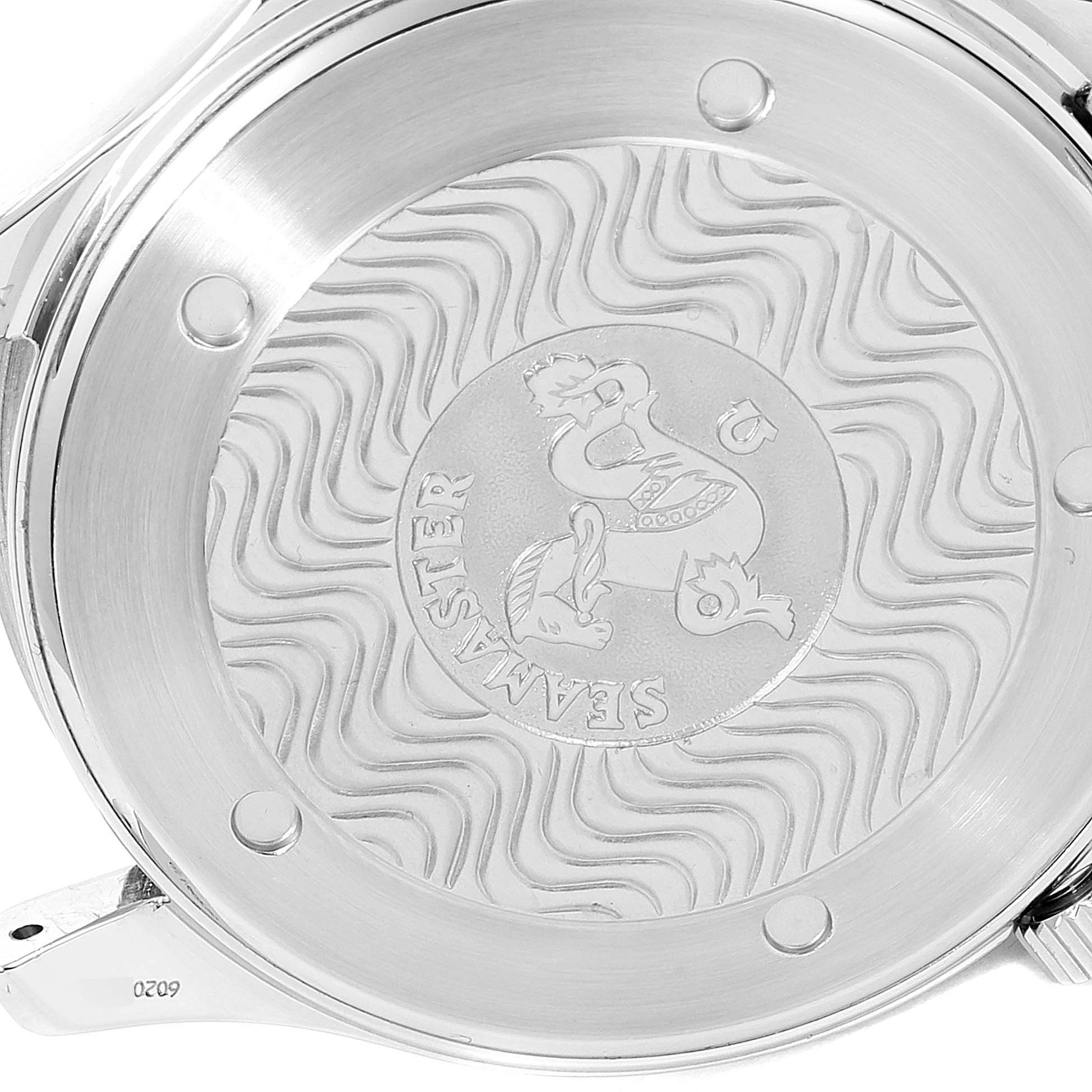 This image shows the case back of an Omega Seamaster 2532.80.00 Men
s Stainless Steel Blue Dial 2532.80.00 Men
s Stainless Steel Blue Dial watch with its engraving and wave pattern design.