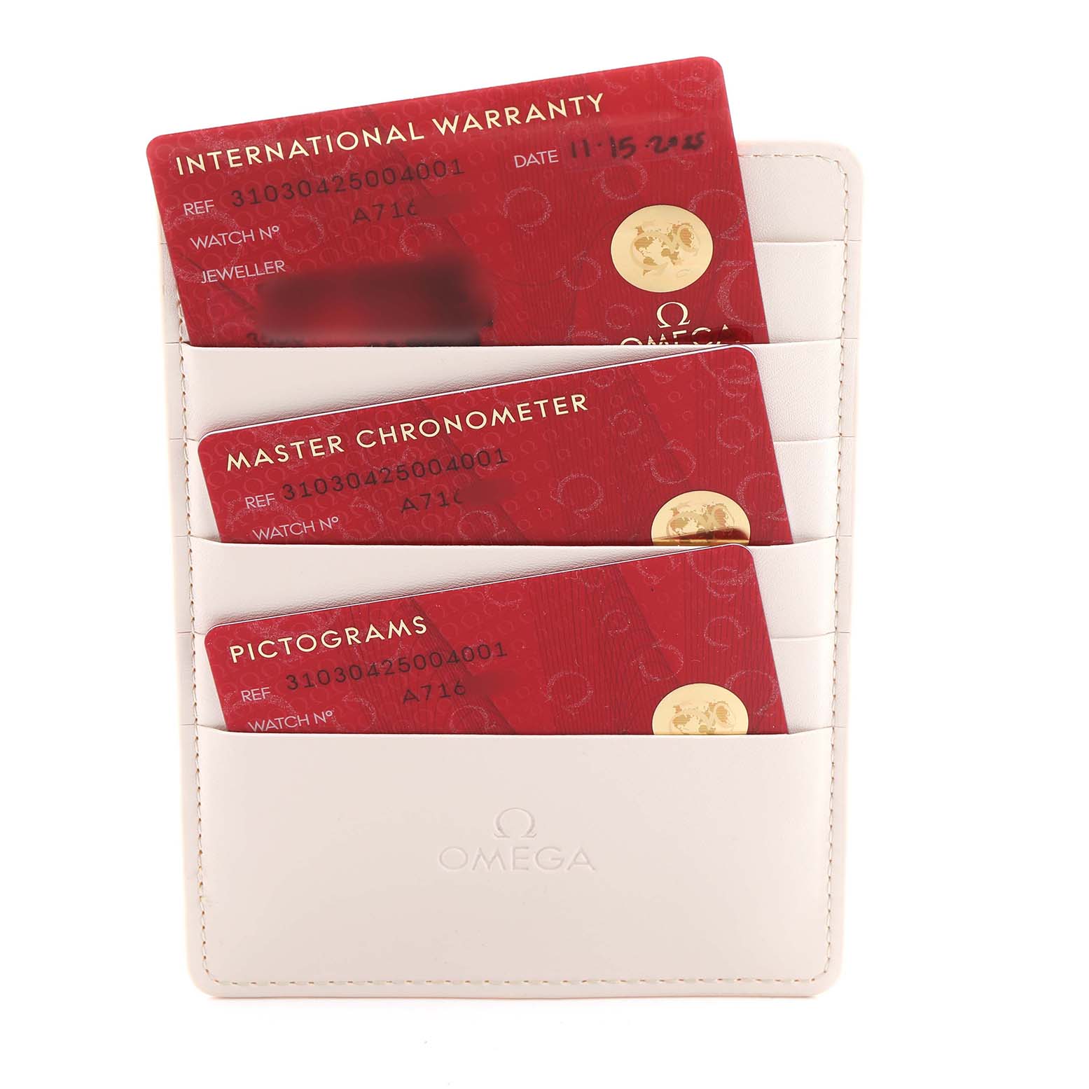 The image shows three Omega Speedmaster 310.30.42.50.04.001 Men's Stainless Steel White Dial warranty and certification cards in a white cardholder.