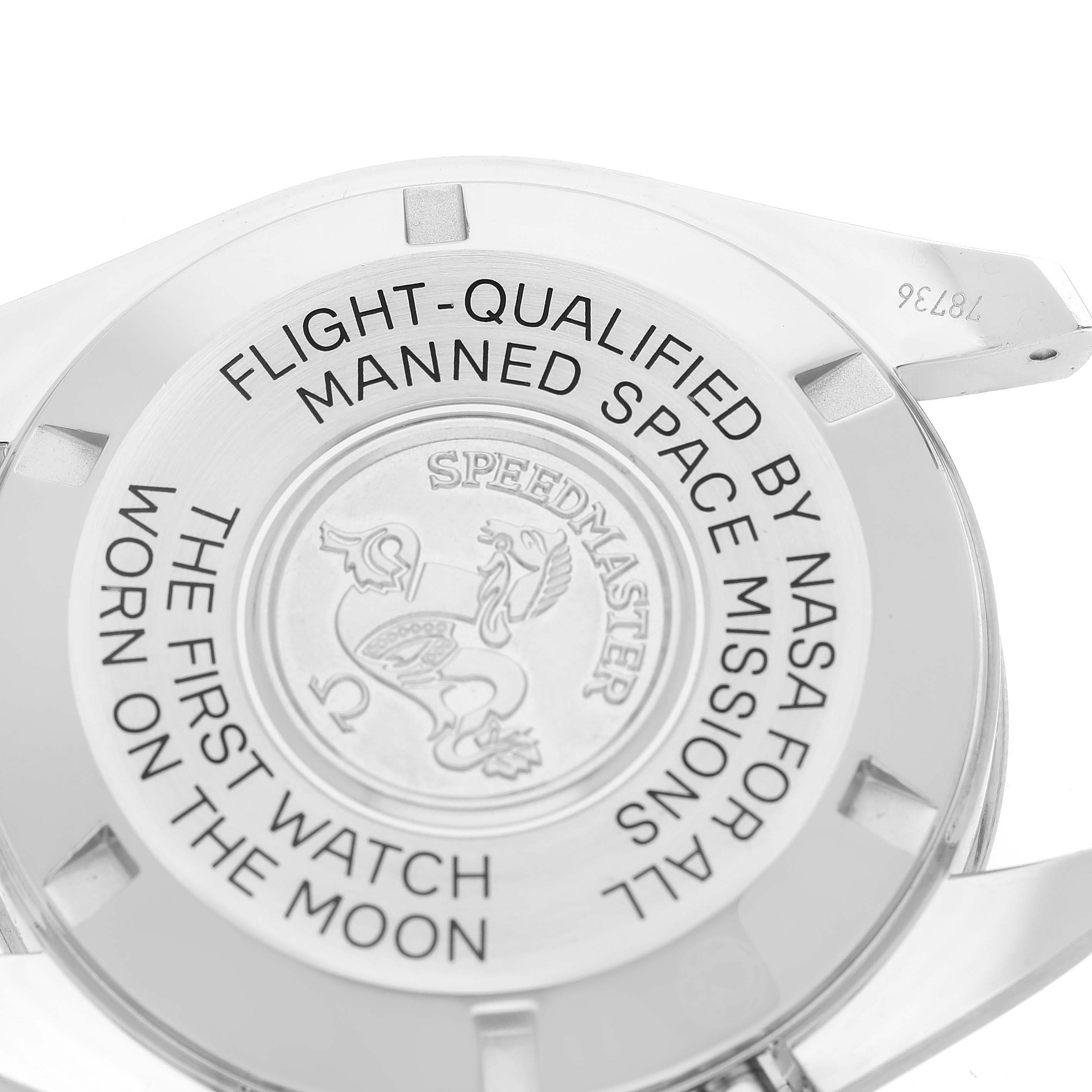 The image shows the case back of an Omega Speedmaster 311.30.42.30.01.005 Men
s Stainless Steel Black Dial 311.30.42.30.01.005 Men
s Stainless Steel Black Dial, highlighting its inscriptions and emblem.