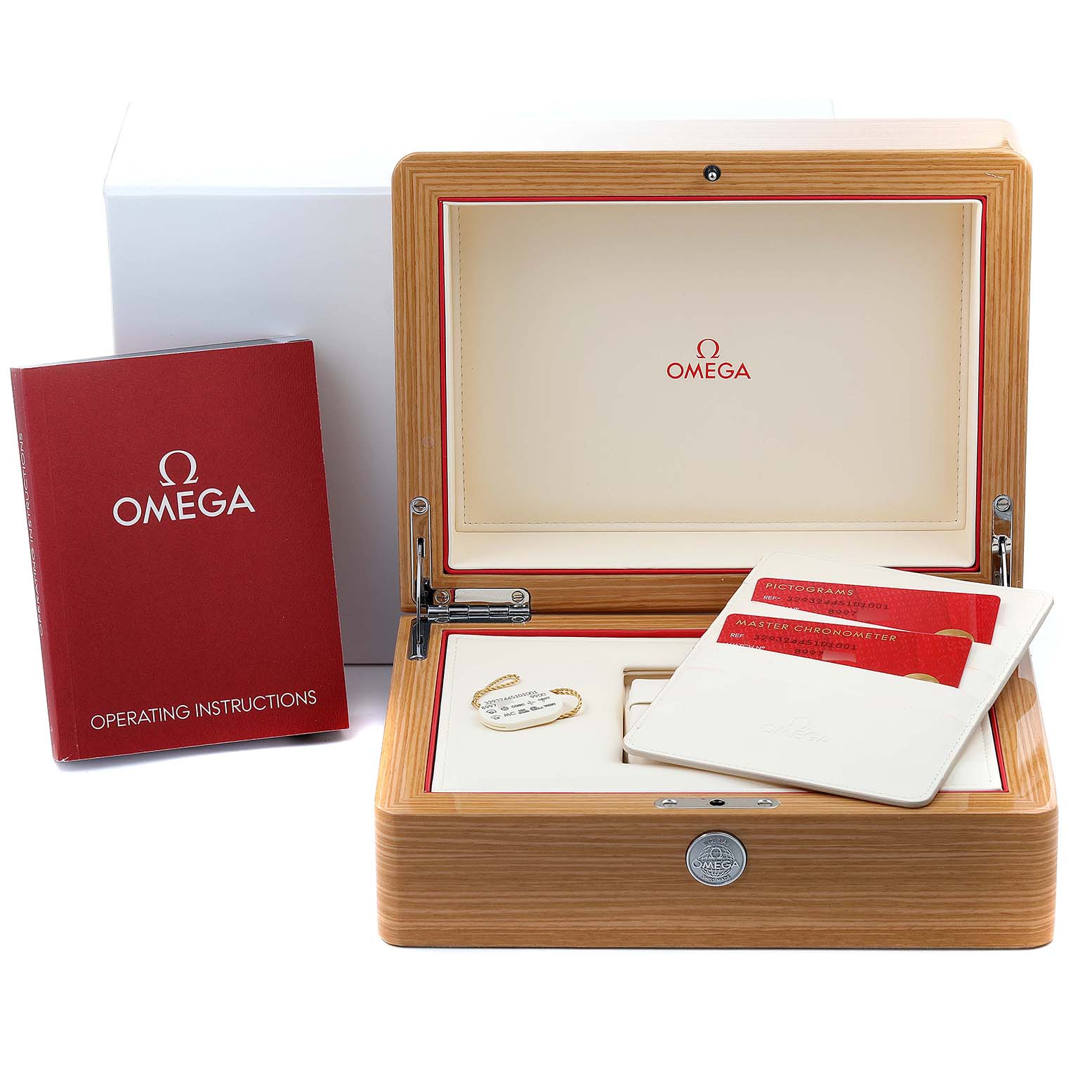 The image shows the Omega Speedmaster 329.32.44.51.01.001 Men
s Stainless Steel Black Dial 329.32.44.51.01.001 Men
s Stainless Steel Black Dial watch box, operating instructions, warranty cards, and a hang tag.