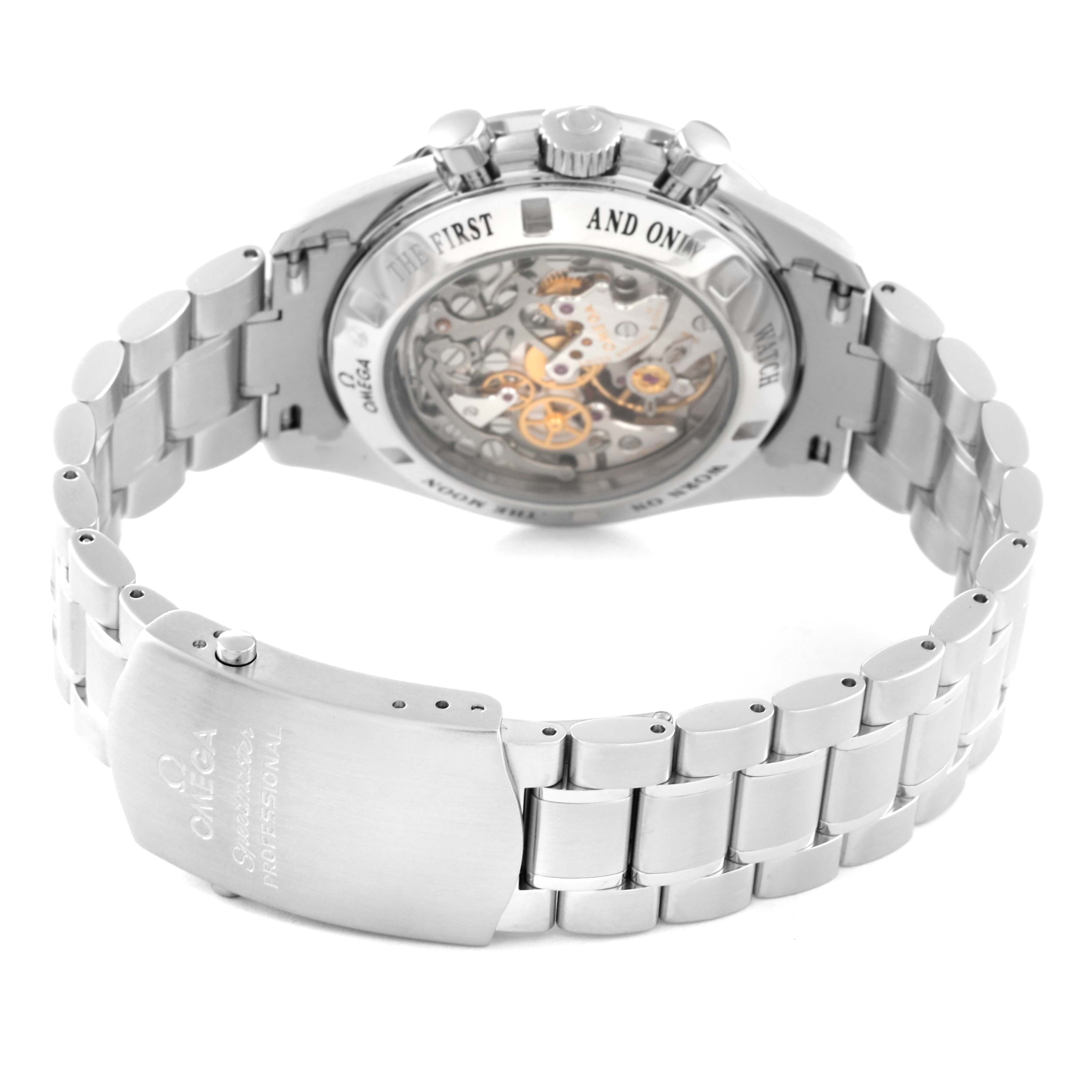 The image shows the back view of an Omega Speedmaster 3573.50.00 Men
s Stainless Steel Black Dial 3573.50.00 Men
s Stainless Steel Black Dial watch, highlighting the exposed movement and bracelet clasp.