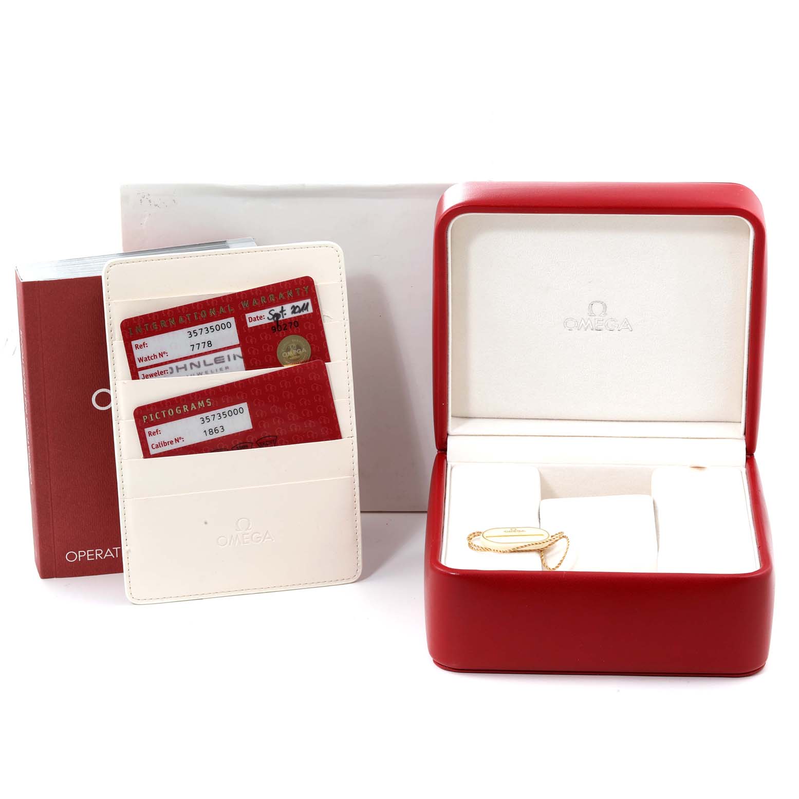 The image shows an Omega Speedmaster 3573.50.00 Men
s Stainless Steel Black Dial 3573.50.00 Men
s Stainless Steel Black Dial watch box, warranty cards, instruction manual, and operating manual.