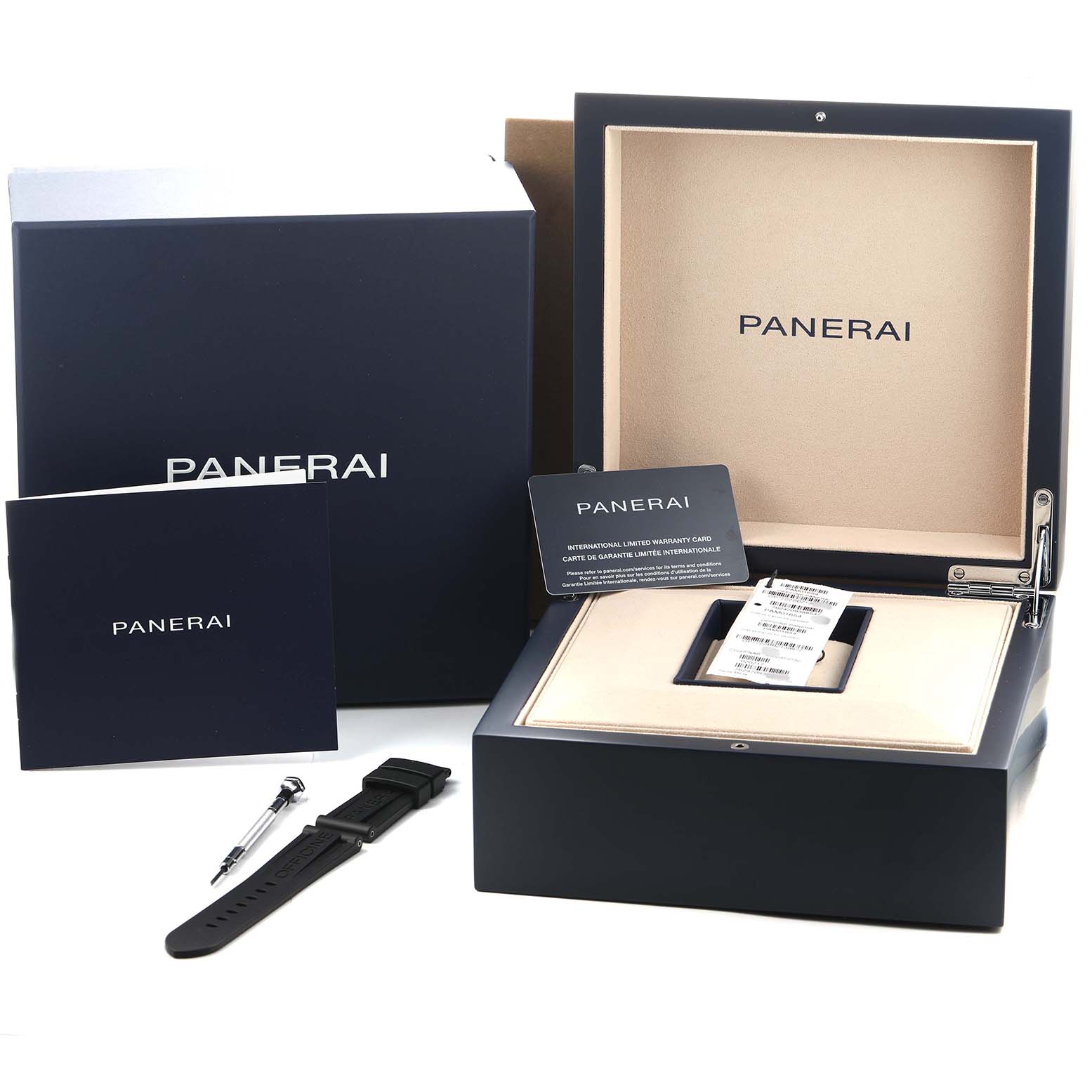 The image shows a Panerai Luminor PAM01654 Men's Titanium Grey Dial watch box, open with accessories including a strap, a tool, and documents.