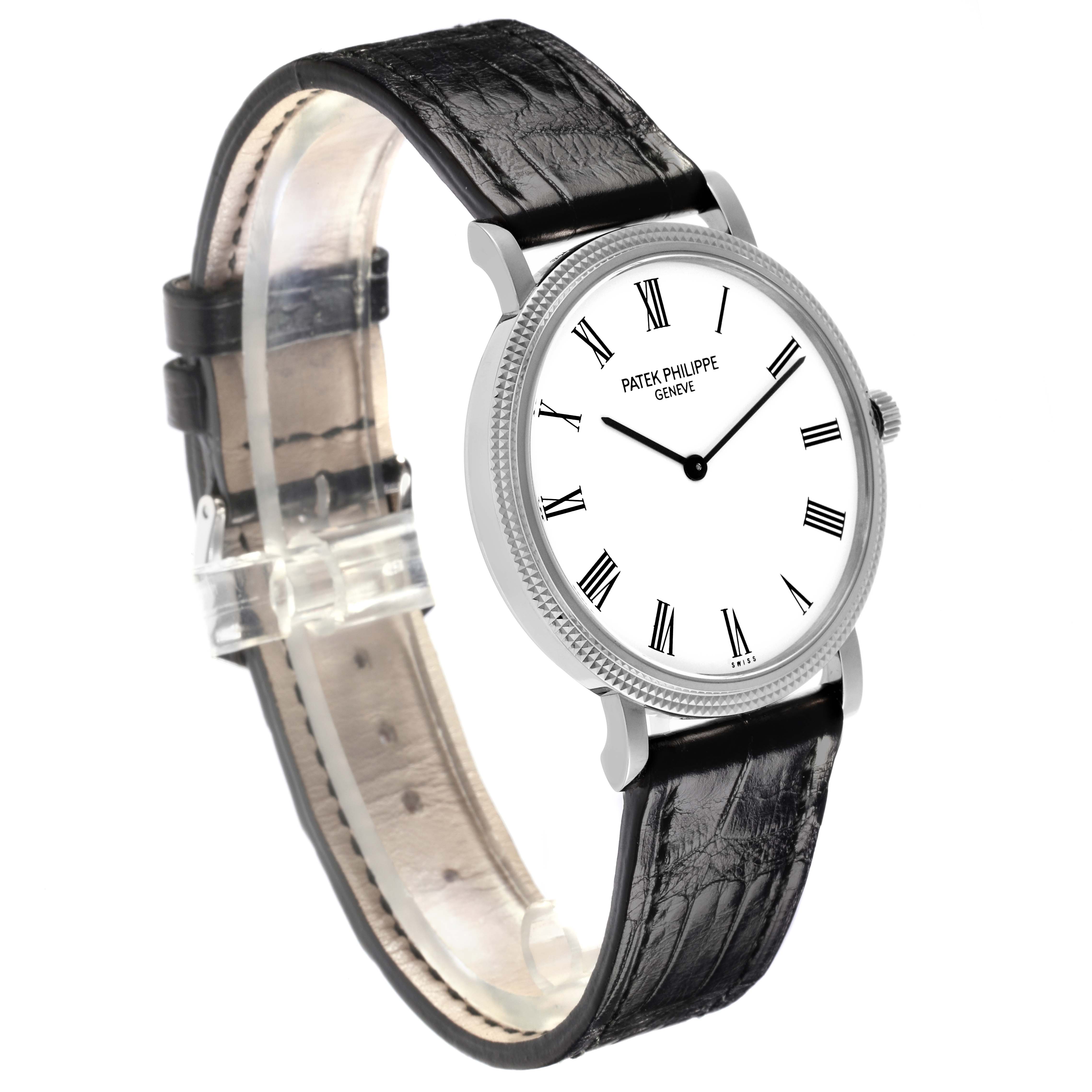 The Patek Philippe Calatrava 5120G-001 Men's White Gold White Dial 5120G-001 Men's White Gold White Dial watch is shown at an angle highlighting the face, bezel, and leather strap.