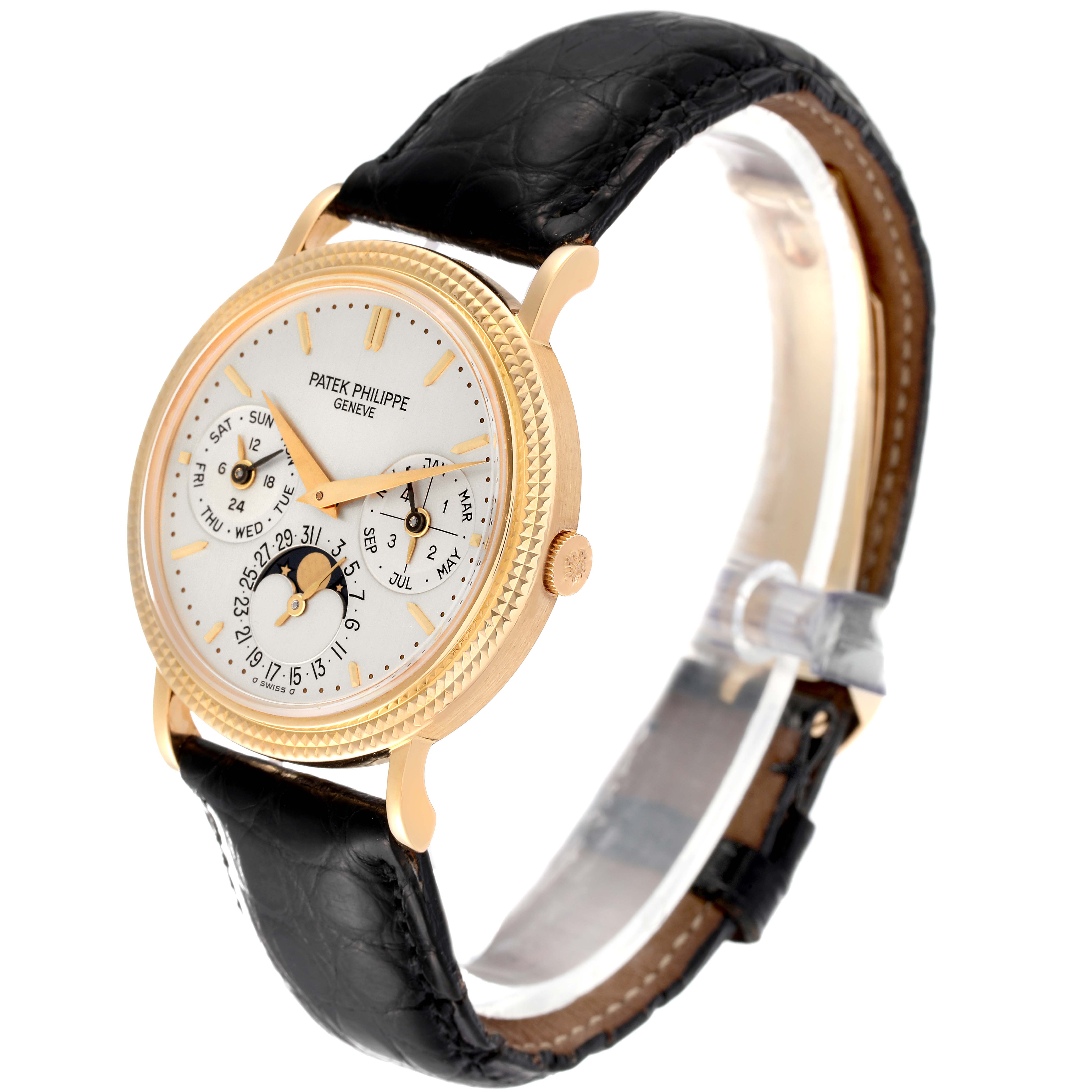 The image shows a side angle view of the Patek Philippe Complications 5039J Men's Yellow Gold Silver Dial 5039J Men's Yellow Gold Silver Dial watch, displaying its dial, case, and black leather strap.