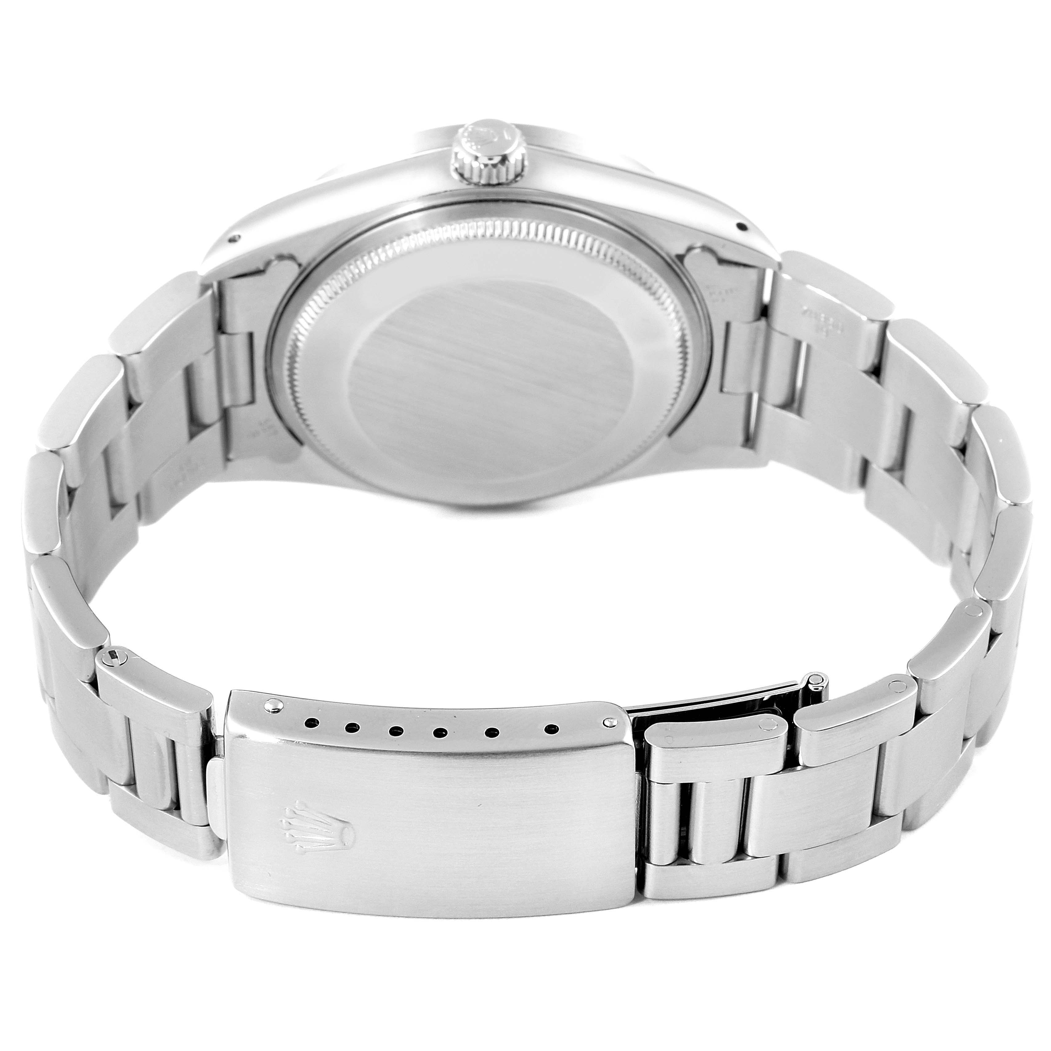 This image shows the back view of the Rolex Air-King 14010 Men's Stainless Steel White Dial 14010 Men's Stainless Steel White Dial watch, highlighting the clasp, bracelet, and caseback.