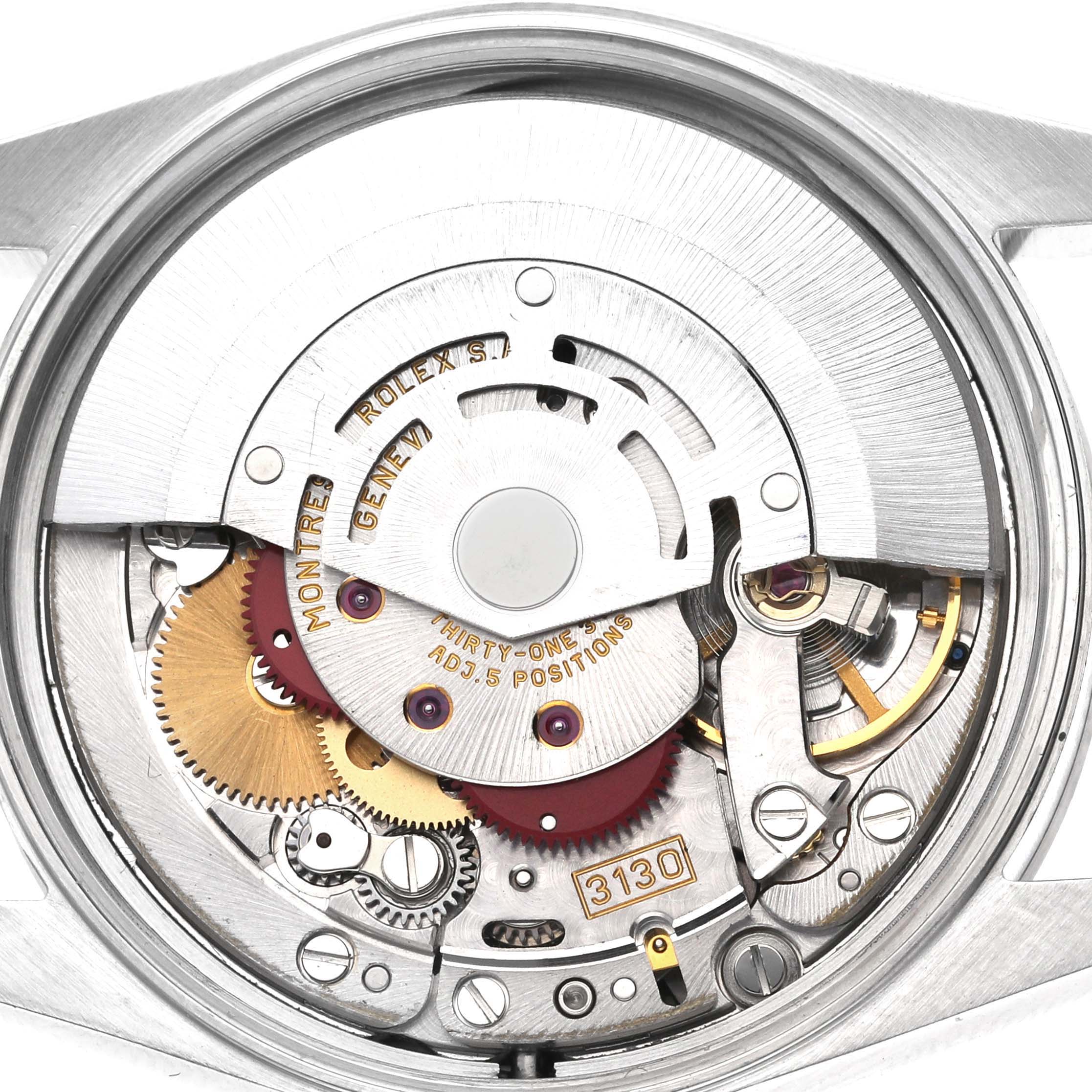 The image shows the intricate internal mechanism of a Rolex Air-King 14000M Men's Stainless Steel Black Dial 14000M Men's Stainless Steel Black Dial watch from a top-down angle.