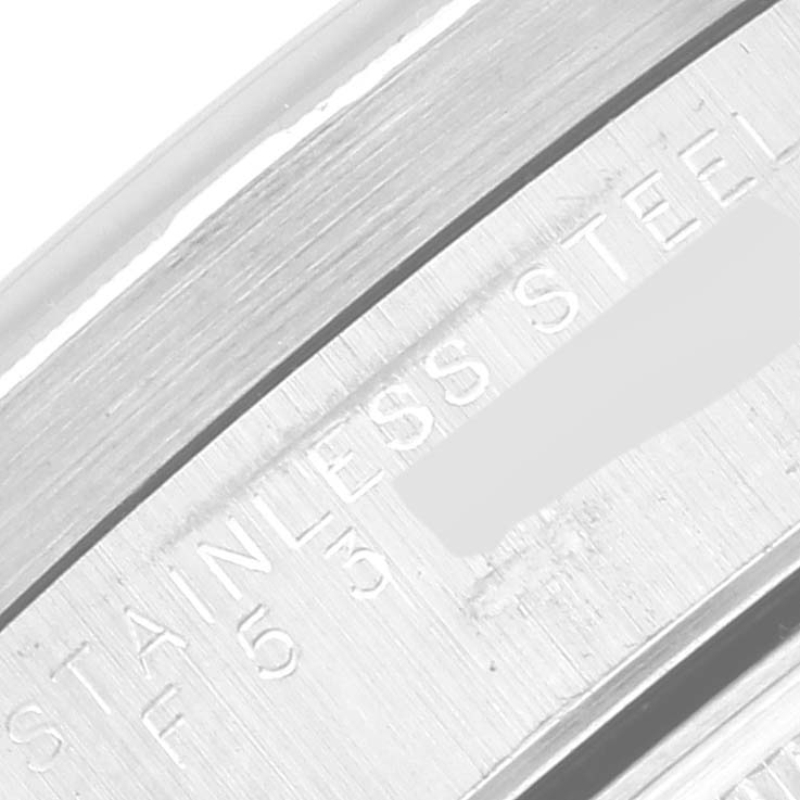This close-up image shows part of the stainless steel clasp of the Rolex Air-King 14010M Men's Stainless Steel Silver Dial 14010M Men's Stainless Steel Silver Dial watch.