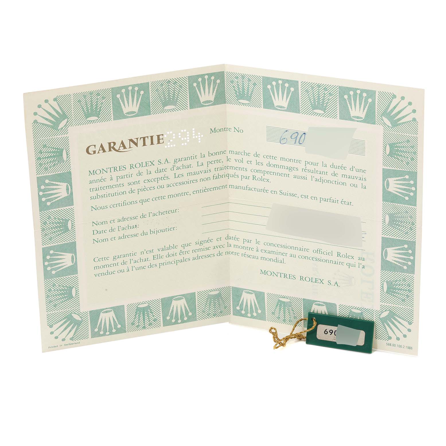 The image shows the guarantee certificate and a tag for the Vintage Collection model by Rolex.