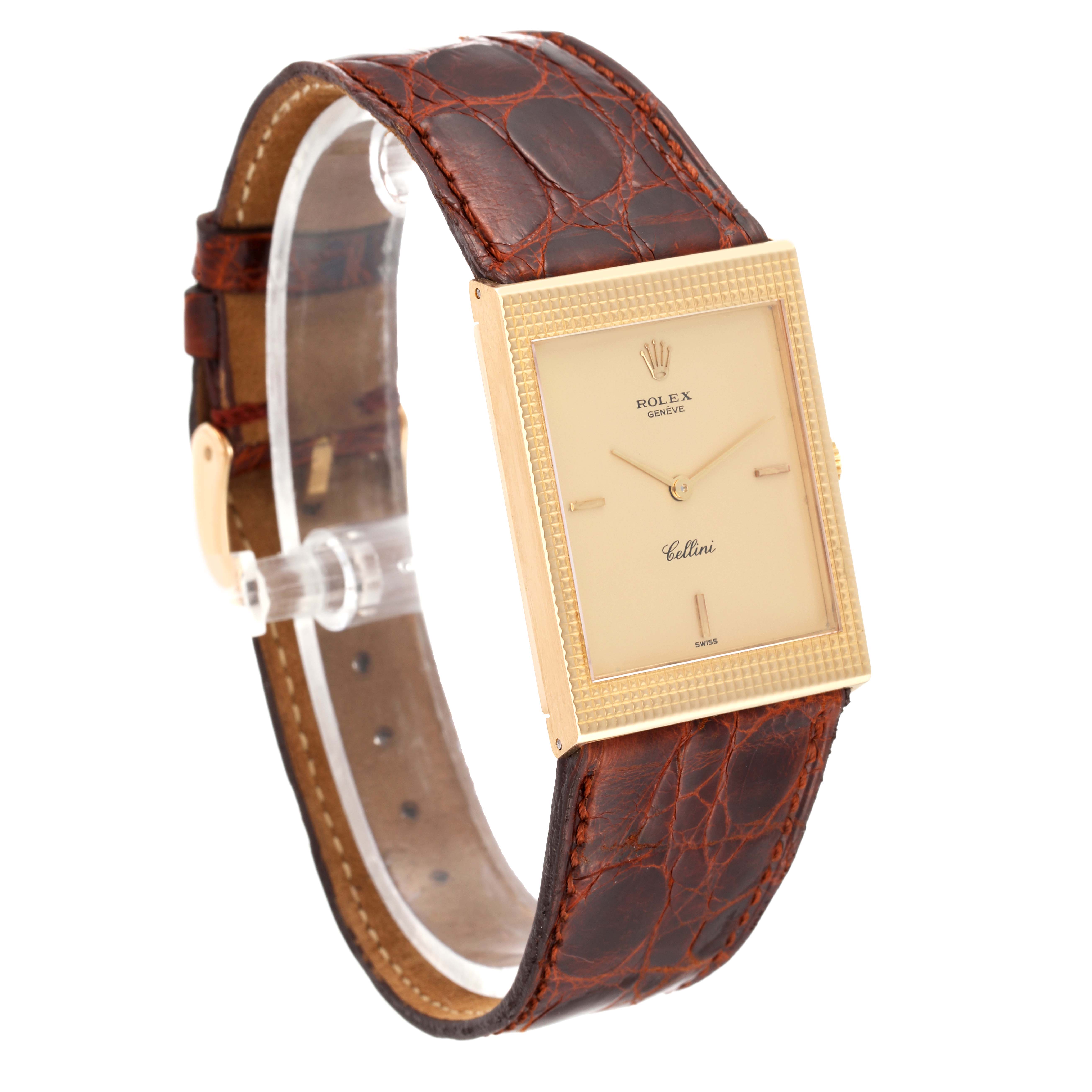 The image shows a Rolex Vintage Collection 4127 Men's Yellow Gold Champagne Dial 4127 Men's Yellow Gold Champagne Dial watch with a rectangular face and brown leather strap at a slight side angle.