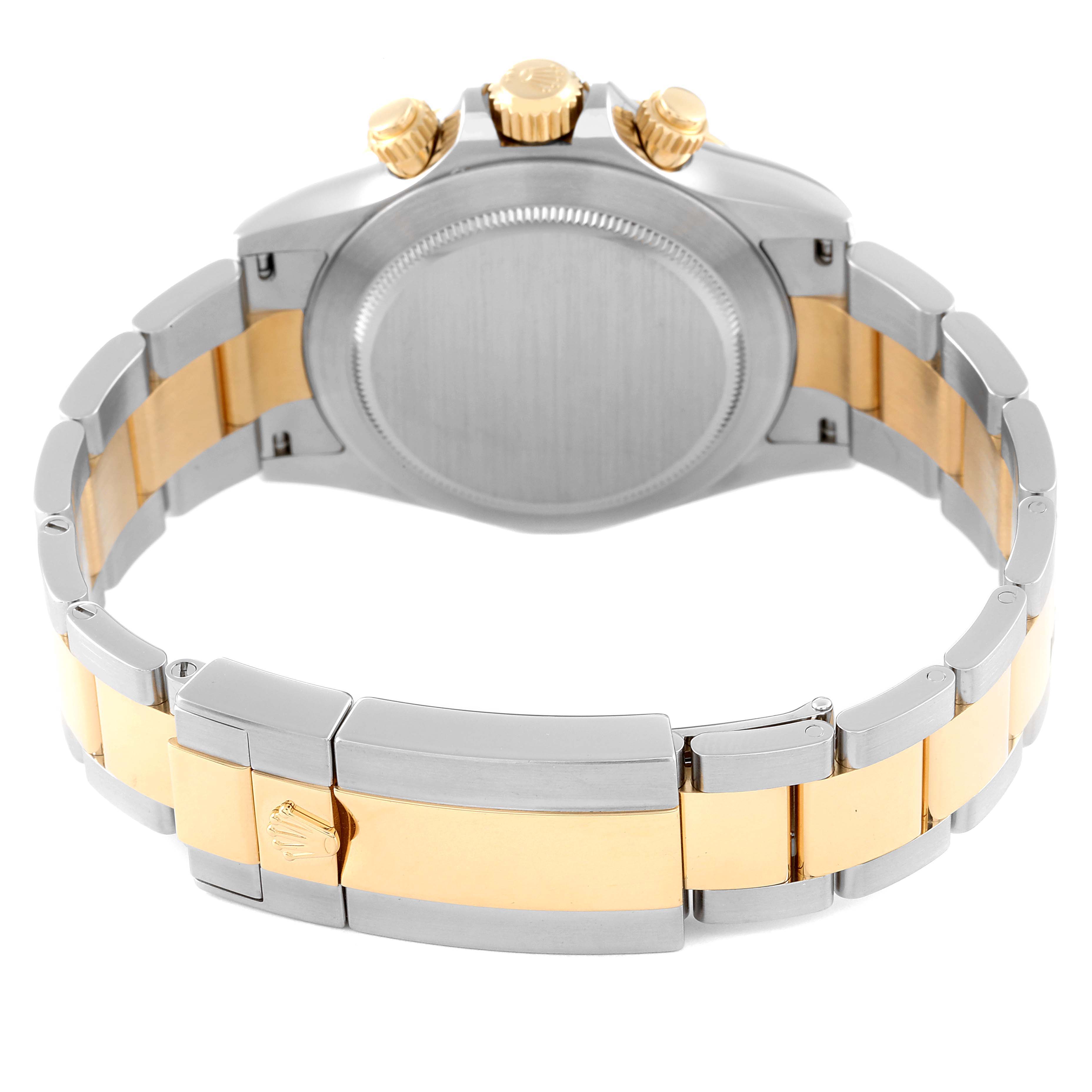 This image shows the bracelet and back case of a Rolex Daytona 116503 Men's Steel and Gold (two tone) Champagne Dial 116503 Men's Steel and Gold (two tone) Champagne Dial watch, focusing on the two-tone metal design.