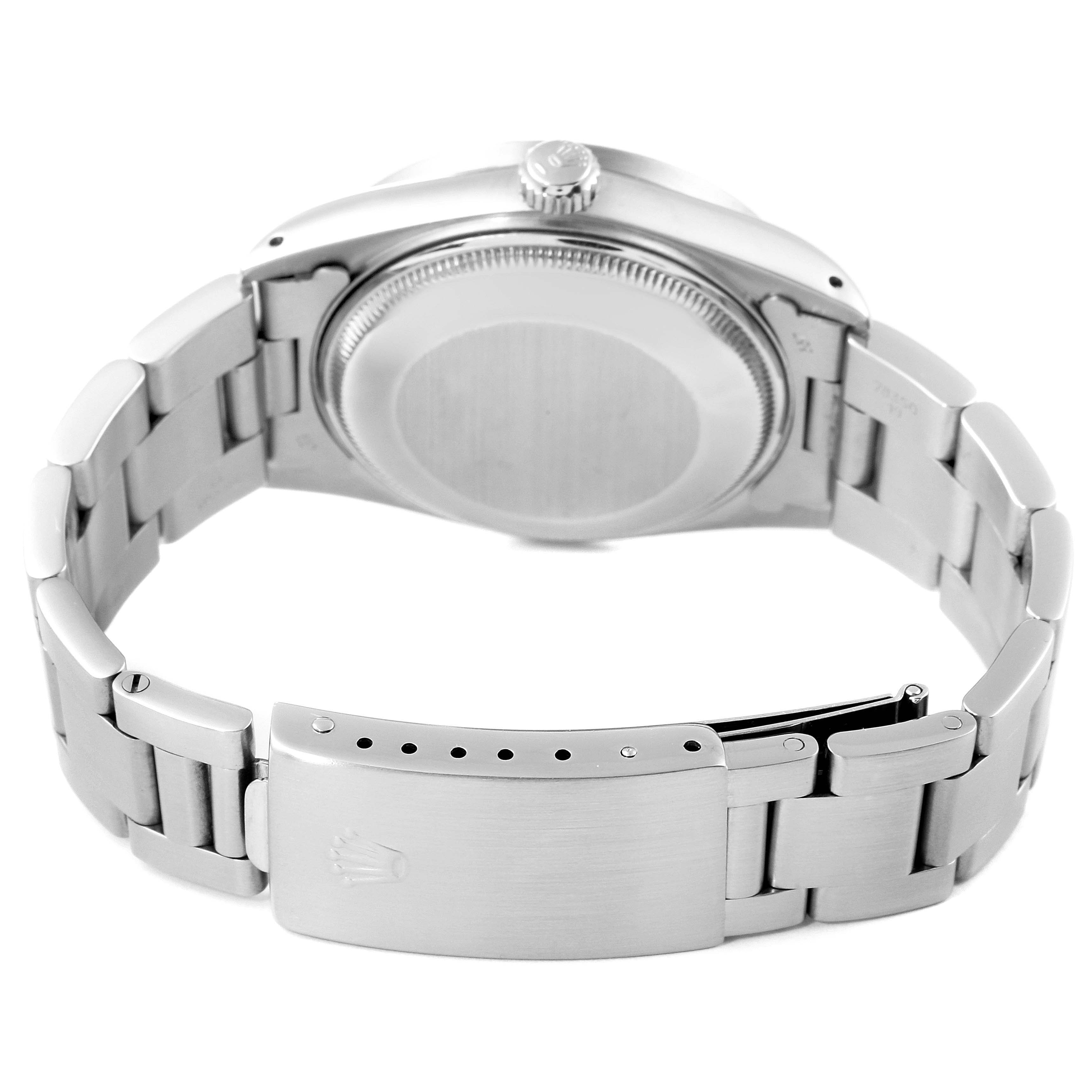 This image shows the back view of a Rolex Date 15010 Men's Stainless Steel White Dial 15010 Men's Stainless Steel White Dial model watch, highlighting the case back, bracelet, and clasp.