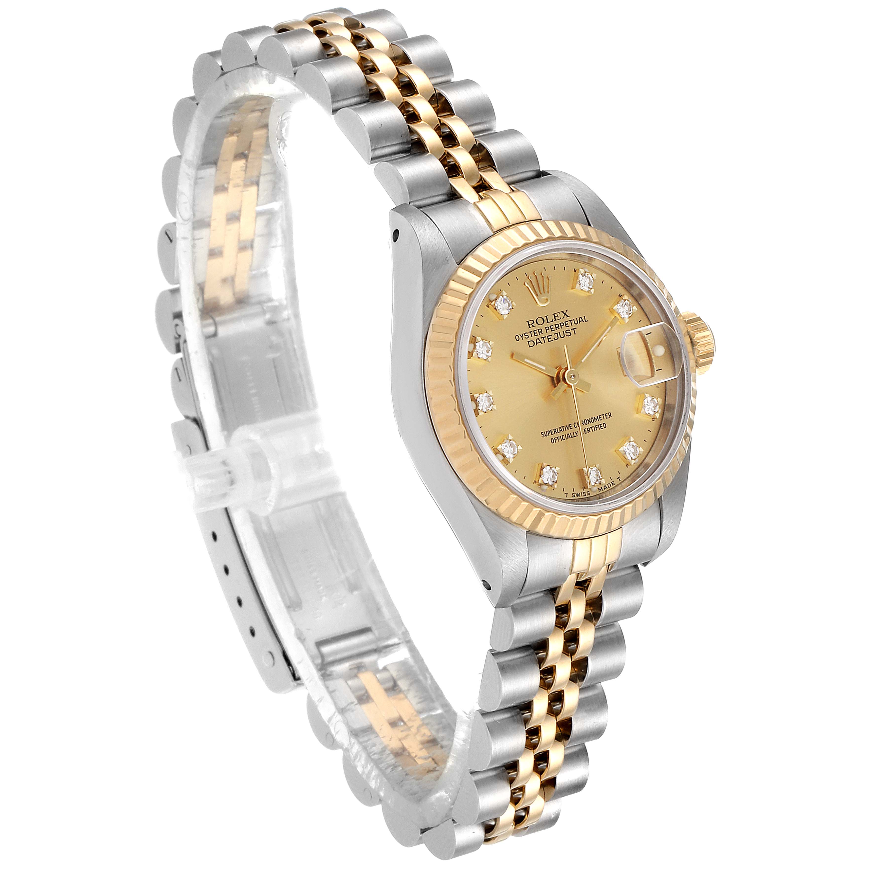 This image shows a Rolex Datejust 69173 Women
s Steel and Gold (two tone) Champagne Dial 69173 Women
s Steel and Gold (two tone) Champagne Dial watch at an oblique angle, highlighting the face, bezel, and two-tone bracelet.