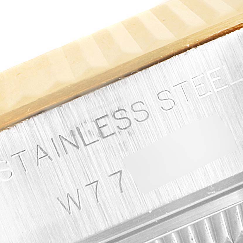 This close-up image shows the stainless steel and partial bezel of a Rolex Datejust 69173 Women
s Steel and Gold (two tone) Champagne Dial 69173 Women
s Steel and Gold (two tone) Champagne Dial watch.