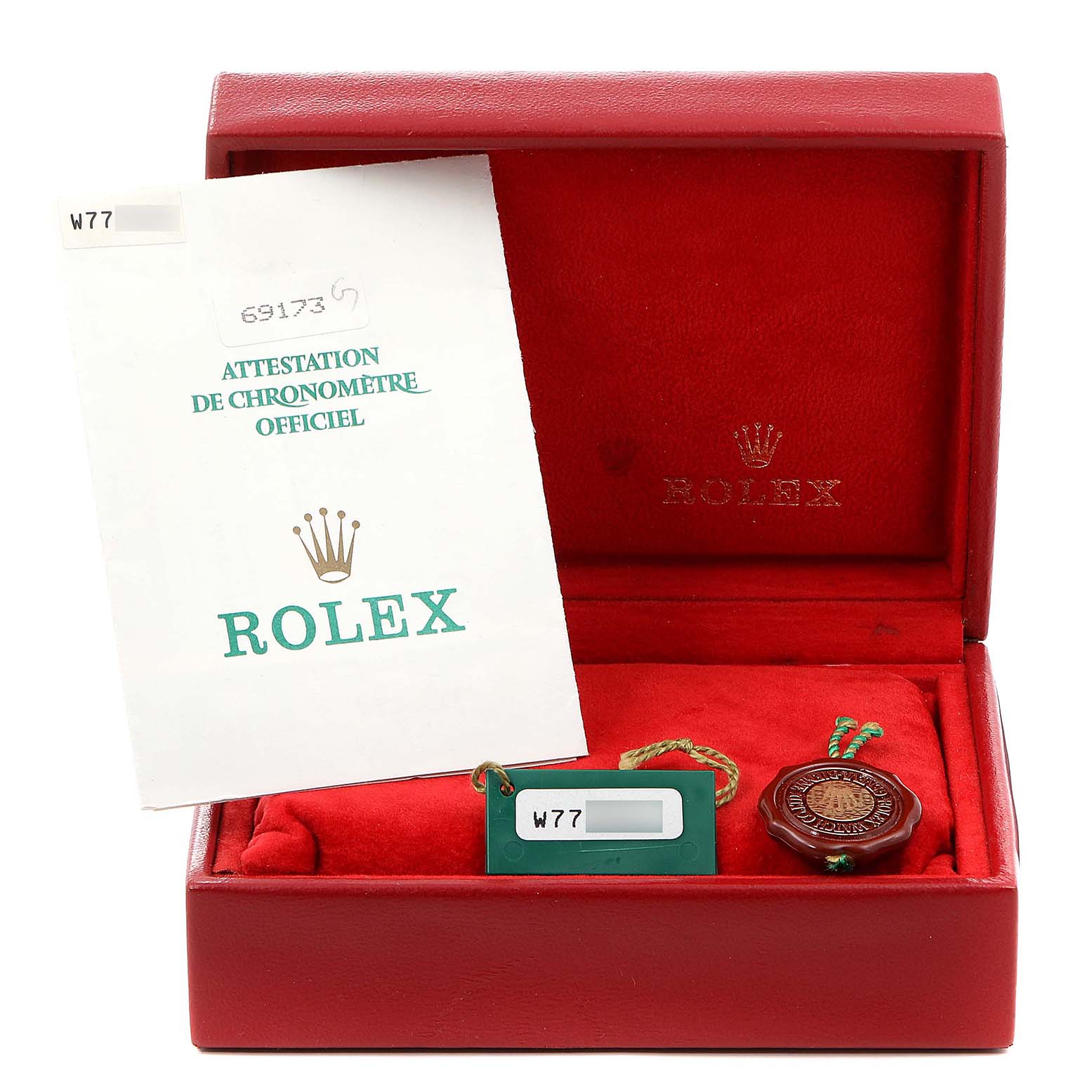 Shown are a Rolex Datejust 69173 Women
s Steel and Gold (two tone) Champagne Dial 69173 Women
s Steel and Gold (two tone) Champagne Dial model box, a tag, and an official chronometer certification.