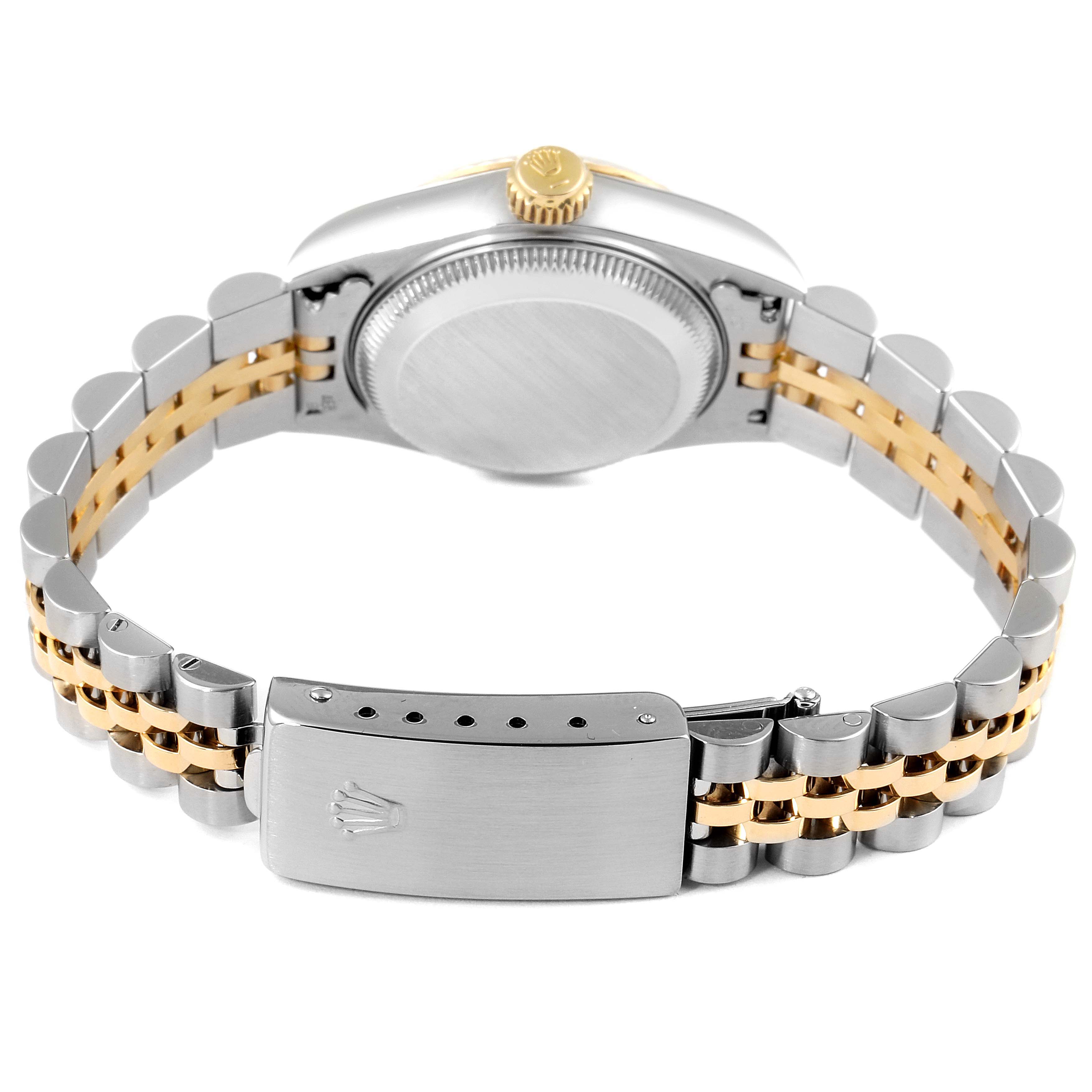The image shows the back view of a Rolex Datejust 69173 Women
s Steel and Gold (two tone) Champagne Dial 69173 Women
s Steel and Gold (two tone) Champagne Dial model, highlighting the case back, bracelet, and clasp.