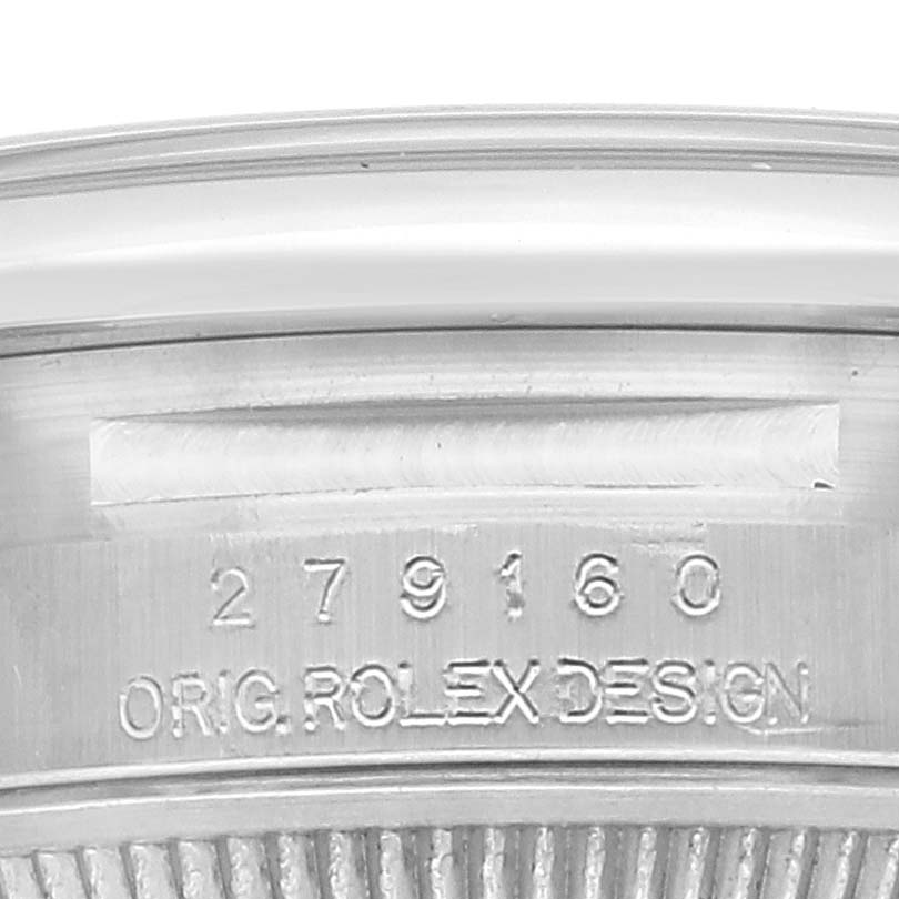 The image shows the case back of a Rolex Datejust 279160 Women's Stainless Steel Pink Dial 279160 Women's Stainless Steel Pink Dial watch, focusing on the engraved serial number and "ORIG. ROLEX DESIGN."