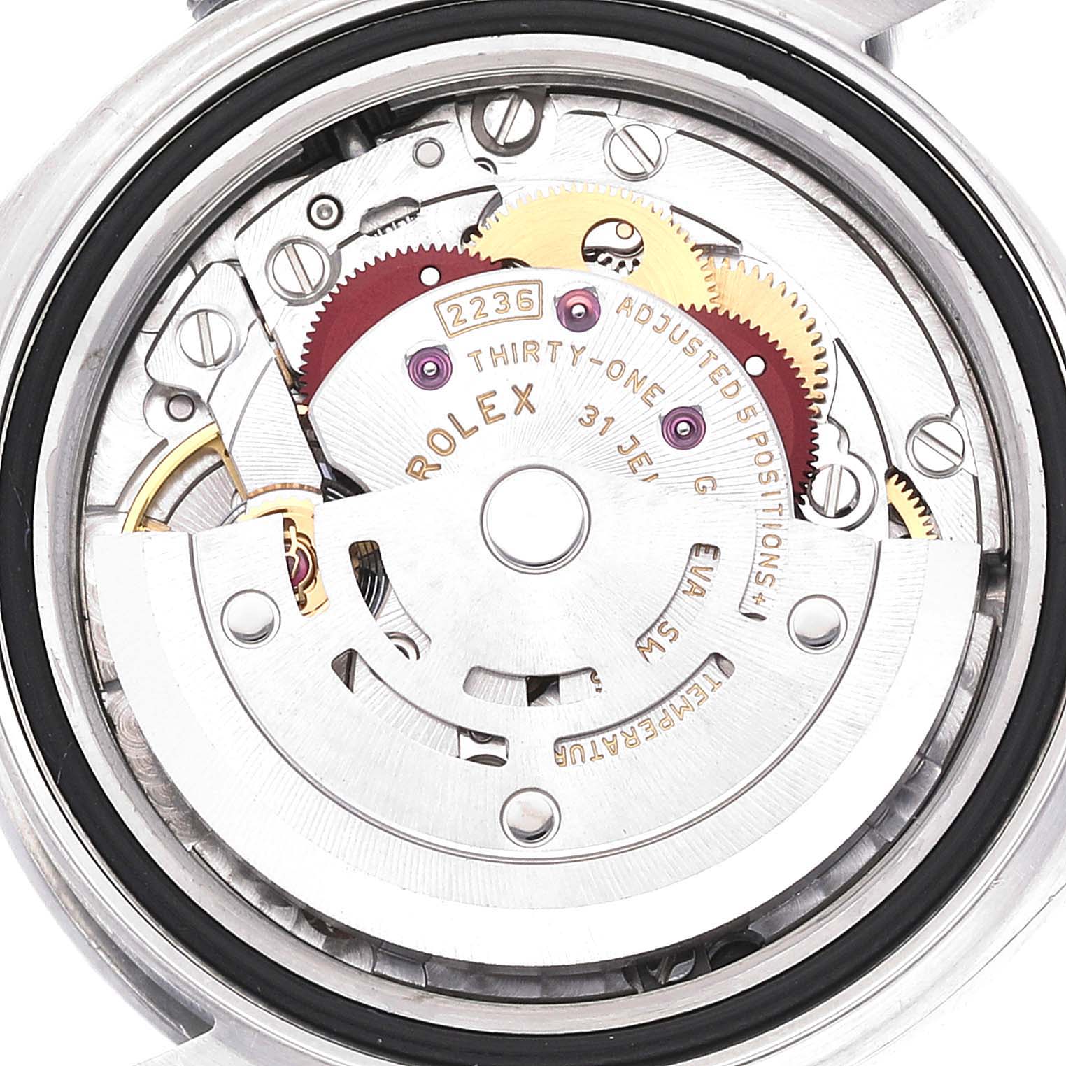 The image shows the interior mechanism of a Rolex Datejust 279160 Women's Stainless Steel Pink Dial 279160 Women's Stainless Steel Pink Dial watch, focusing on its gears and movement components.