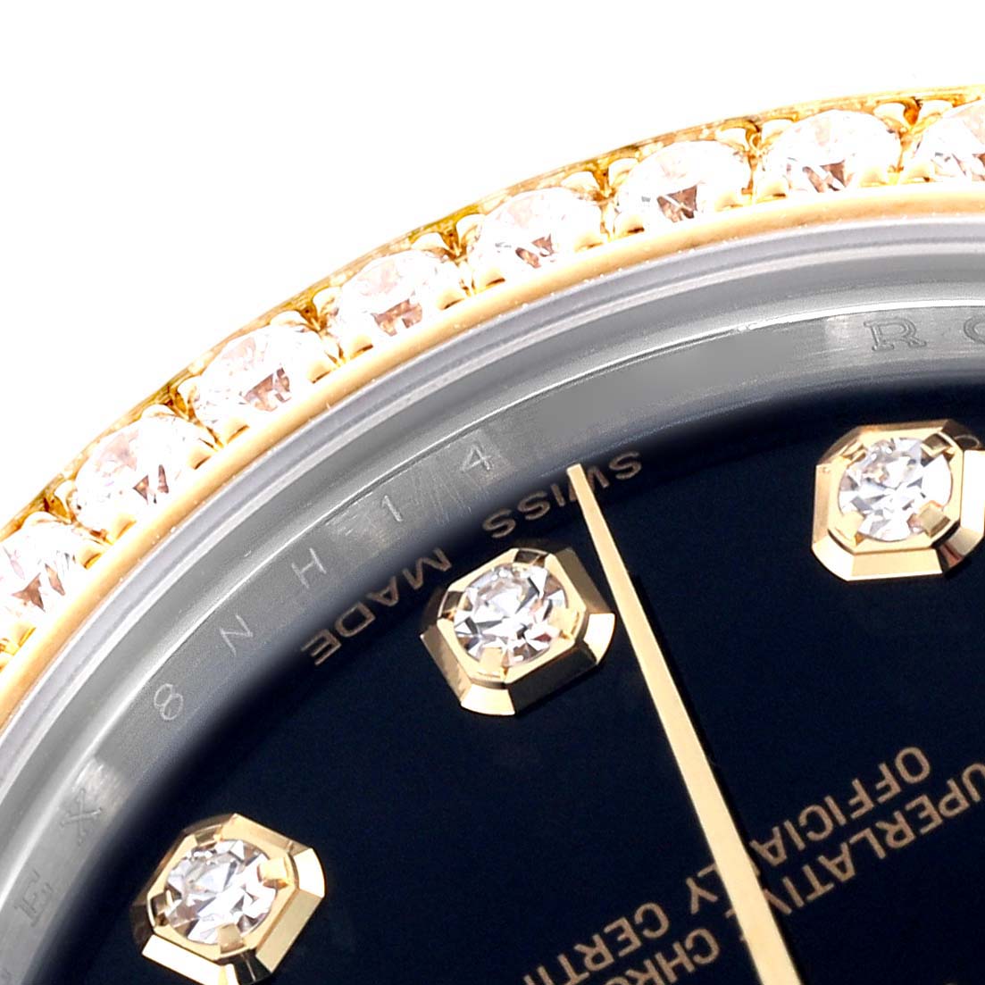 The image shows a close-up of a Rolex Mid-Size 178383 Women's Steel and Gold (two tone) Black Dial 178383 Women's Steel and Gold (two tone) Black Dial watch bezel, dial, and diamond markers.