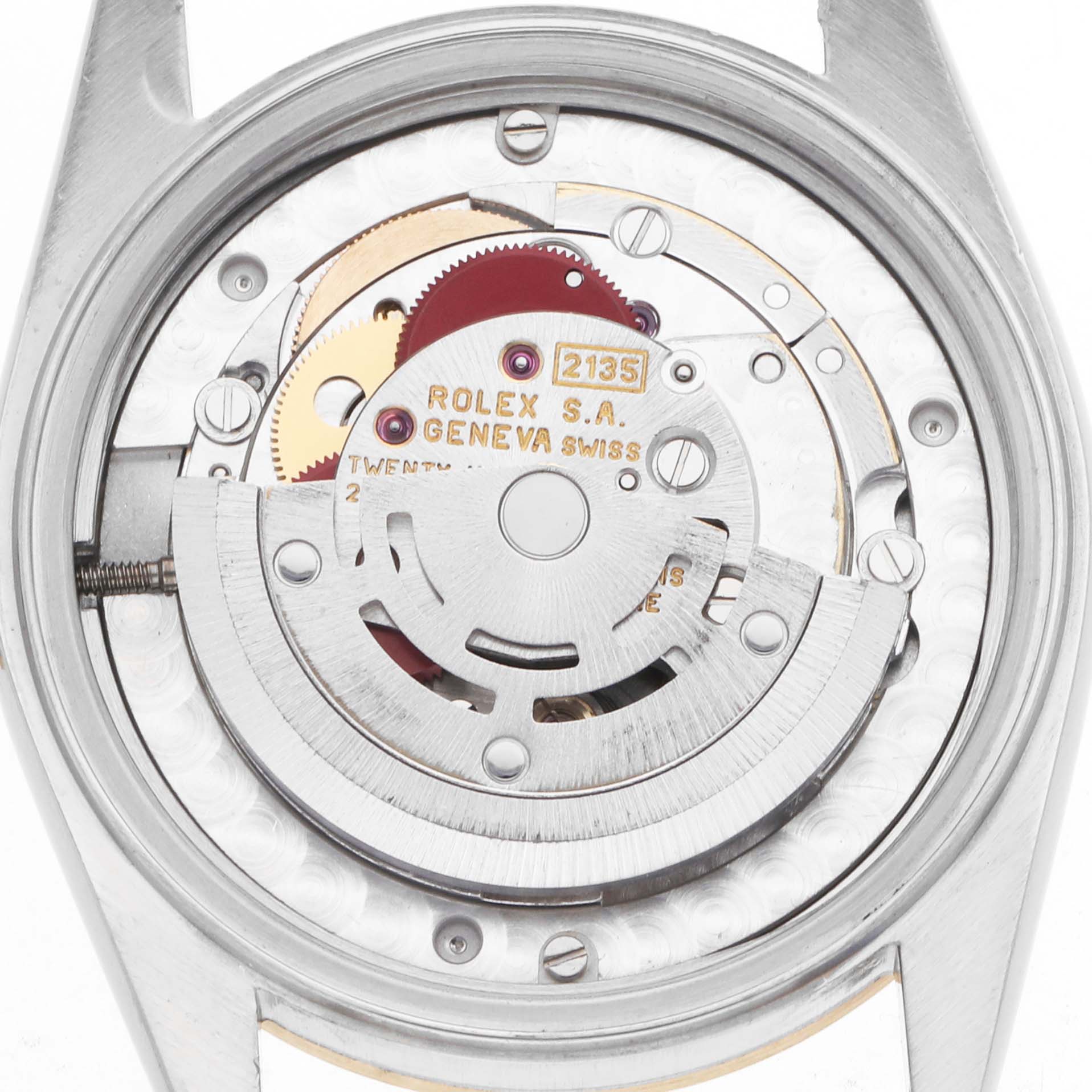 The image shows the movement of the Rolex Datejust 68273 Women's Steel and Gold (two tone) White Dial, viewed from the back with visible gears and the rotor.
