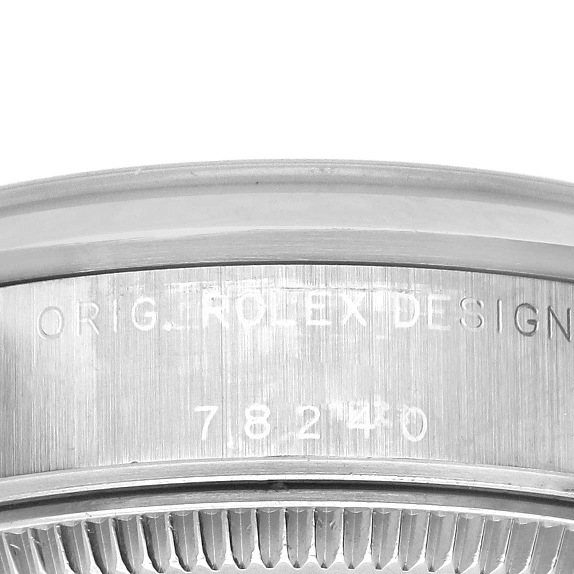 The image shows a close-up of the side engraving on a Rolex Mid-Size 78240 Women's Stainless Steel White Dial 78240 Women's Stainless Steel White Dial model, highlighting the "ORIG ROLEX DESIGN" and reference number.