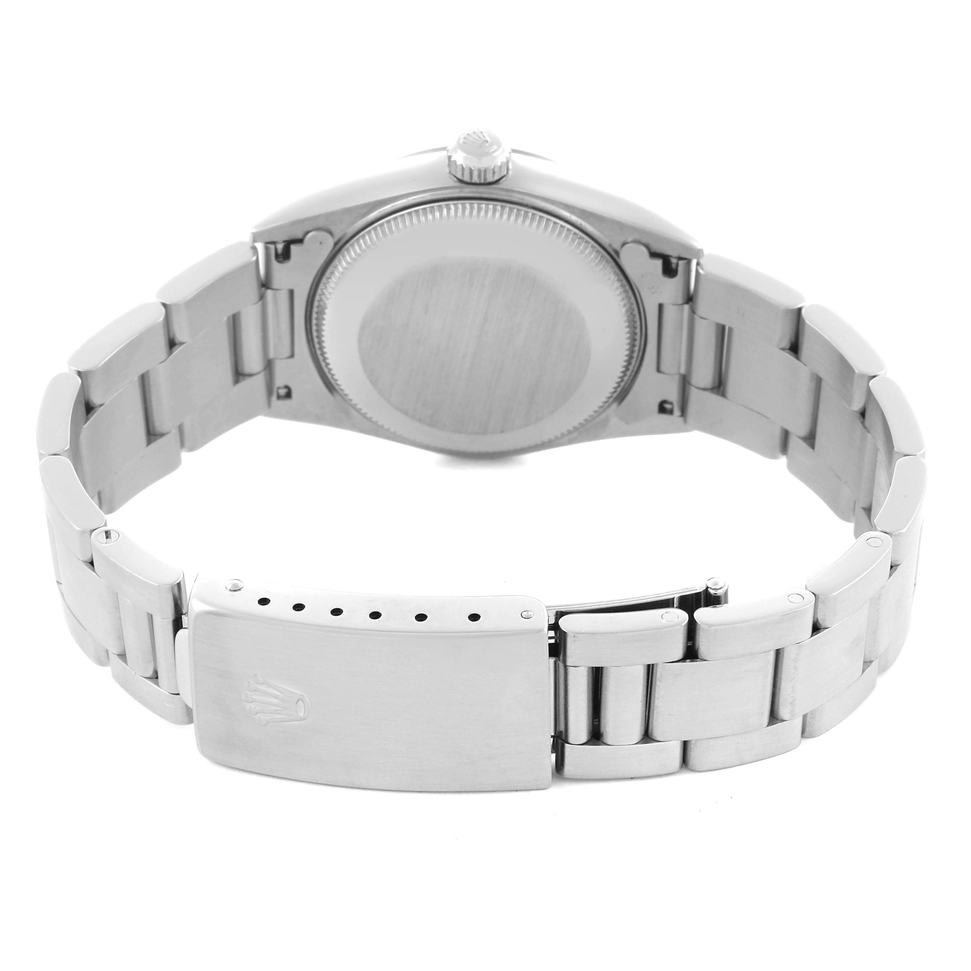 The image shows the back and bracelet of a Mid-Size Rolex watch, including the clasp and case back.