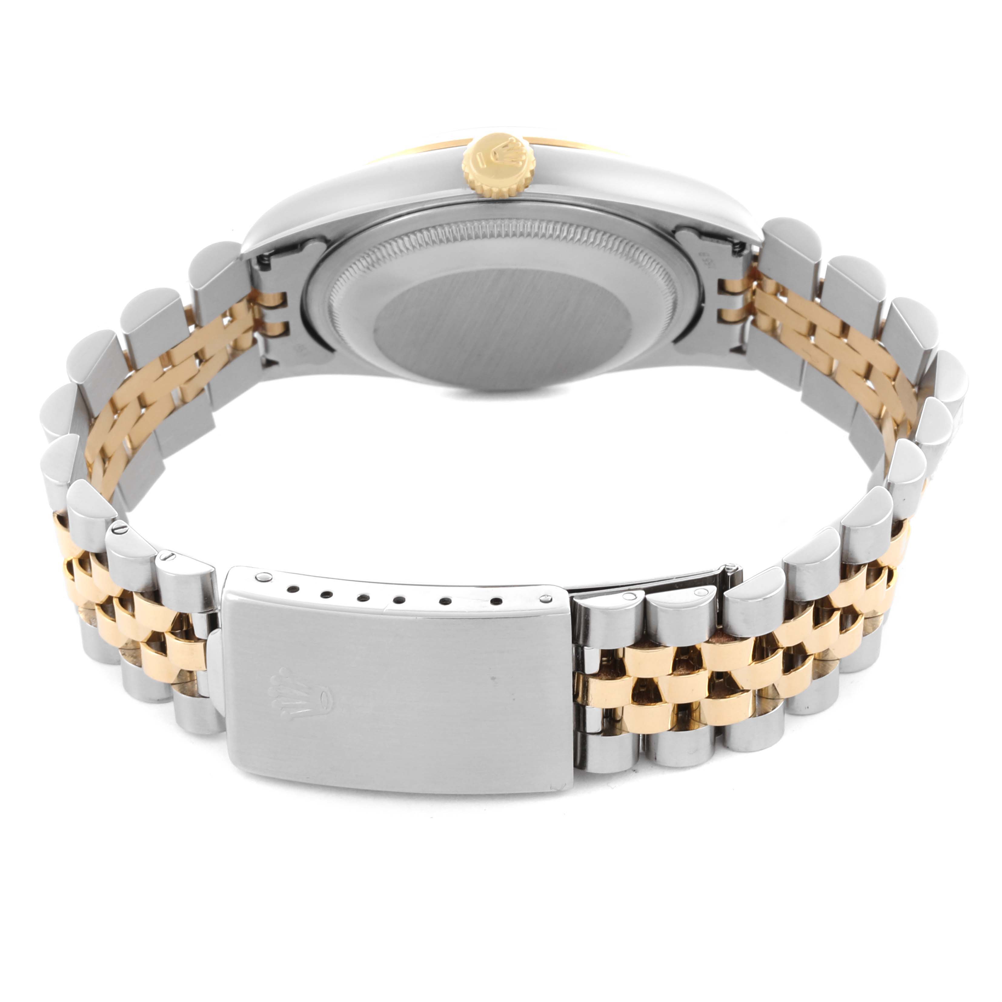 The image shows the back and side of the Rolex Datejust 16233 Men's Steel and Gold (two tone) Champagne Dial 16233 Men's Steel and Gold (two tone) Champagne Dial, highlighting the case, crown, and two-tone bracelet clasp.