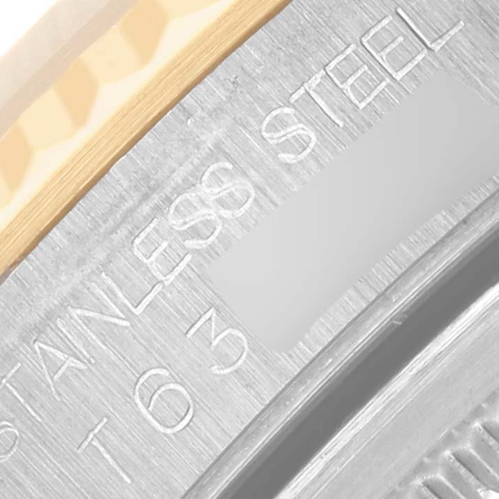 The close-up image shows the bezel and case side of a Rolex Datejust 16233 Men's Steel and Gold (two tone) Champagne Dial 16233 Men's Steel and Gold (two tone) Champagne Dial, highlighting the stainless steel marking.