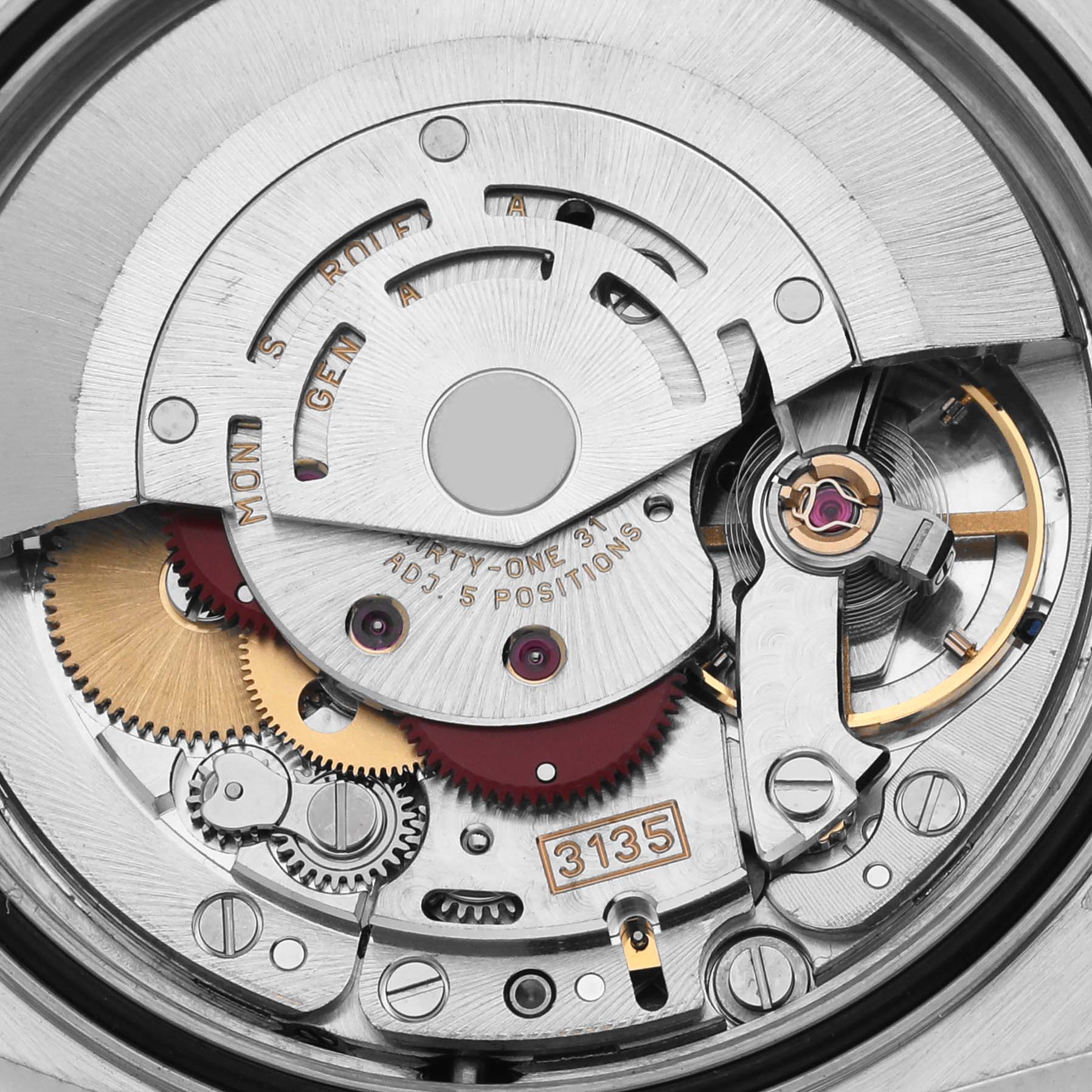 This image shows a close-up of the Rolex Datejust 16233 Men's Steel and Gold (two tone) Champagne Dial 16233 Men's Steel and Gold (two tone) Champagne Dial's movement, focusing on the gears and rotor mechanism.