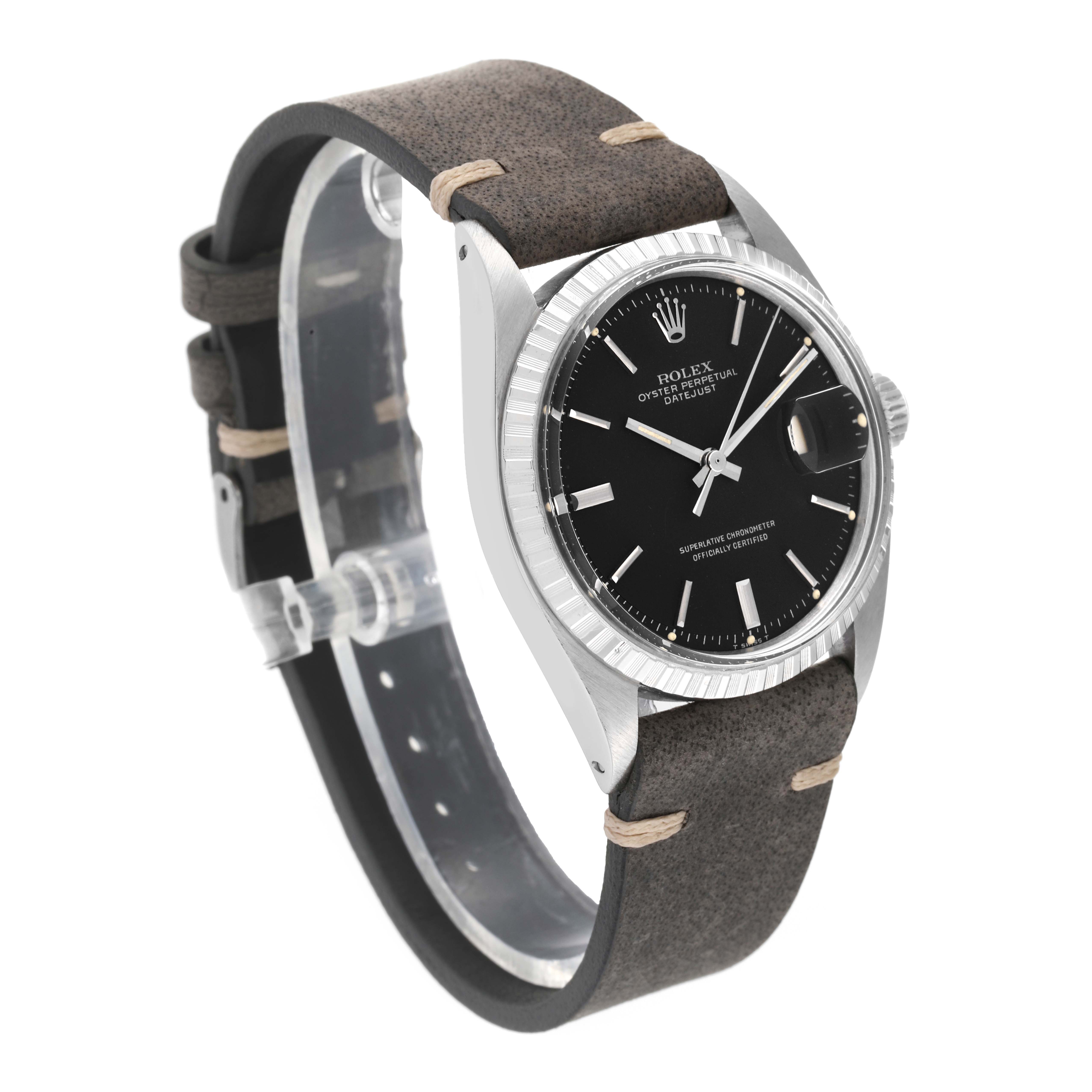 This Rolex Vintage Collection 1603 Men's Stainless Steel Black Dial 1603 Men's Stainless Steel Black Dial watch is shown at an angle revealing the face, bezel, crown, and a leather strap.