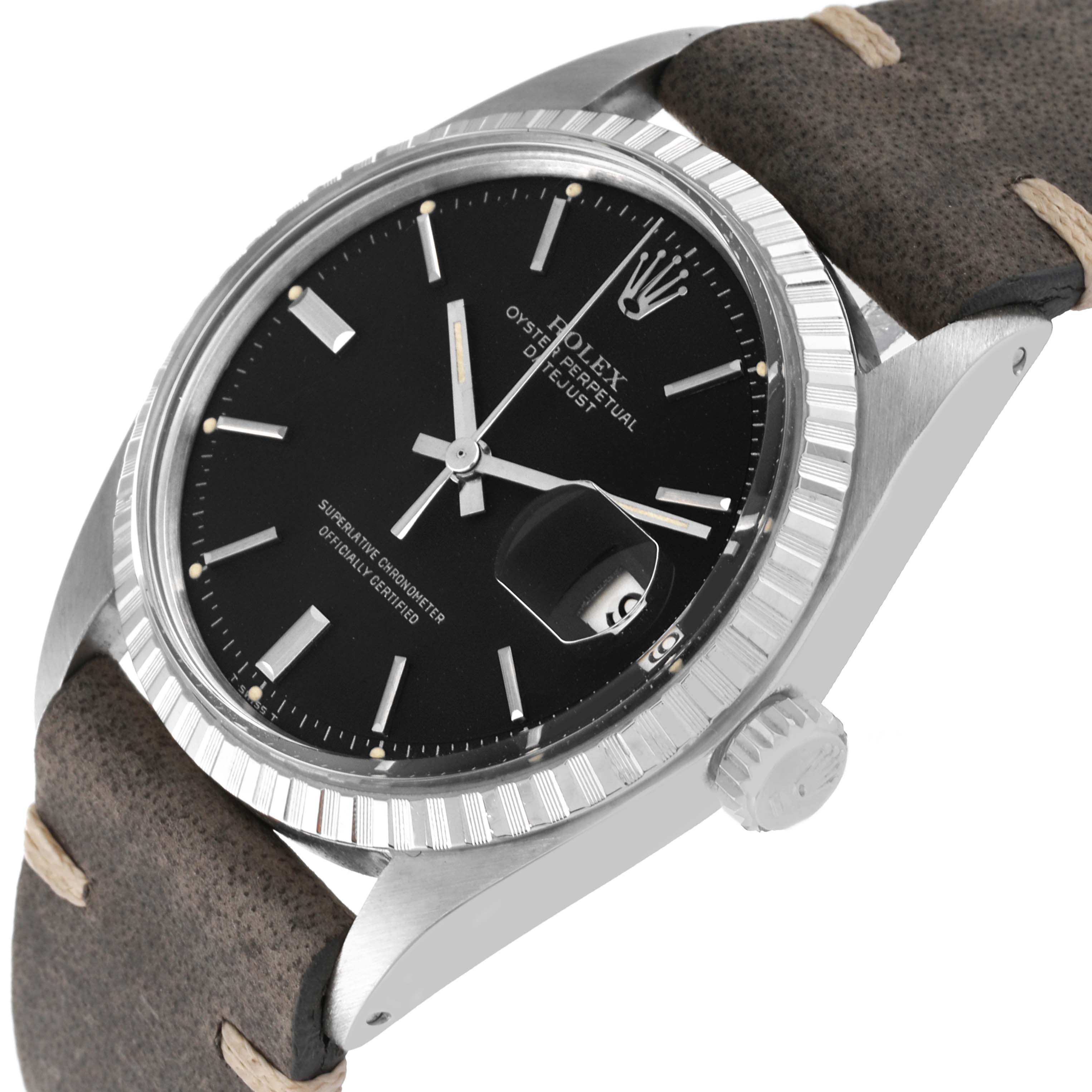 The image shows an angled view of the Rolex Vintage Collection 1603 Men's Stainless Steel Black Dial 1603 Men's Stainless Steel Black Dial Oyster Perpetual Datejust watch face and crown, with a leather strap.