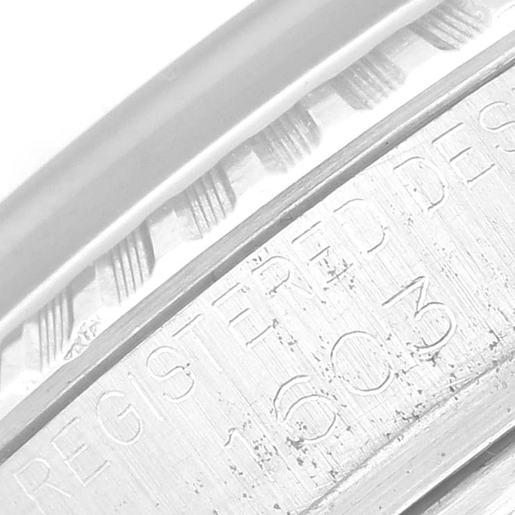 The image shows a close-up of the engraved details on the case back of the Rolex Vintage Collection 1603 Men's Stainless Steel Black Dial 1603 Men's Stainless Steel Black Dial model.