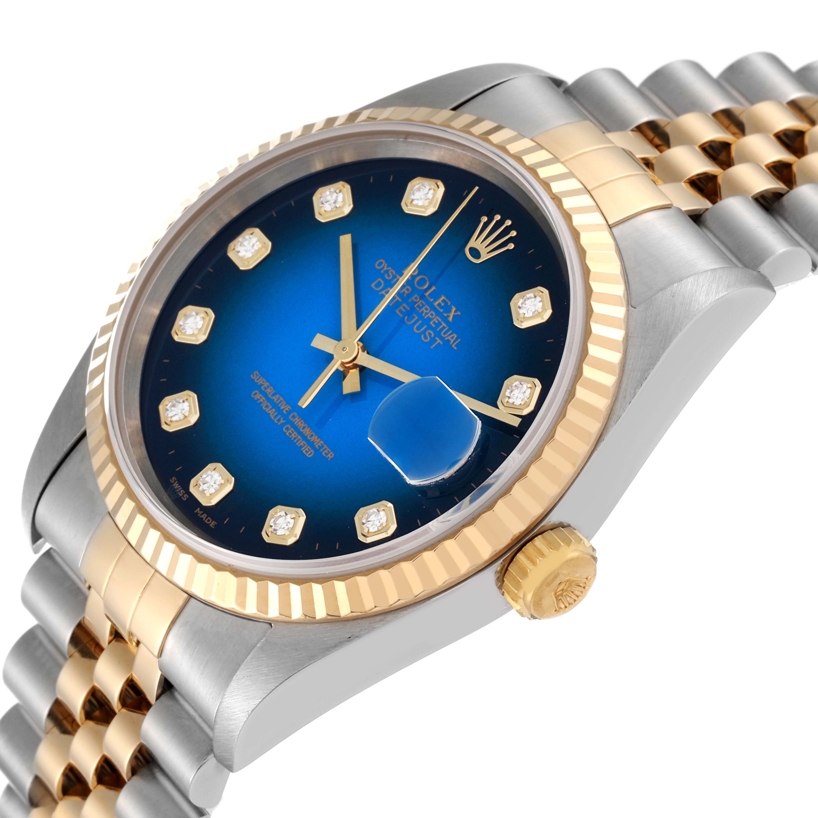 This image shows a close-up of the Rolex Datejust 16233 Men's Steel and Gold (two tone) Blue Dial 16233 Men's Steel and Gold (two tone) Blue Dial watch at a slight angle, highlighting the blue dial, bezel, crown, and part of the strap.
