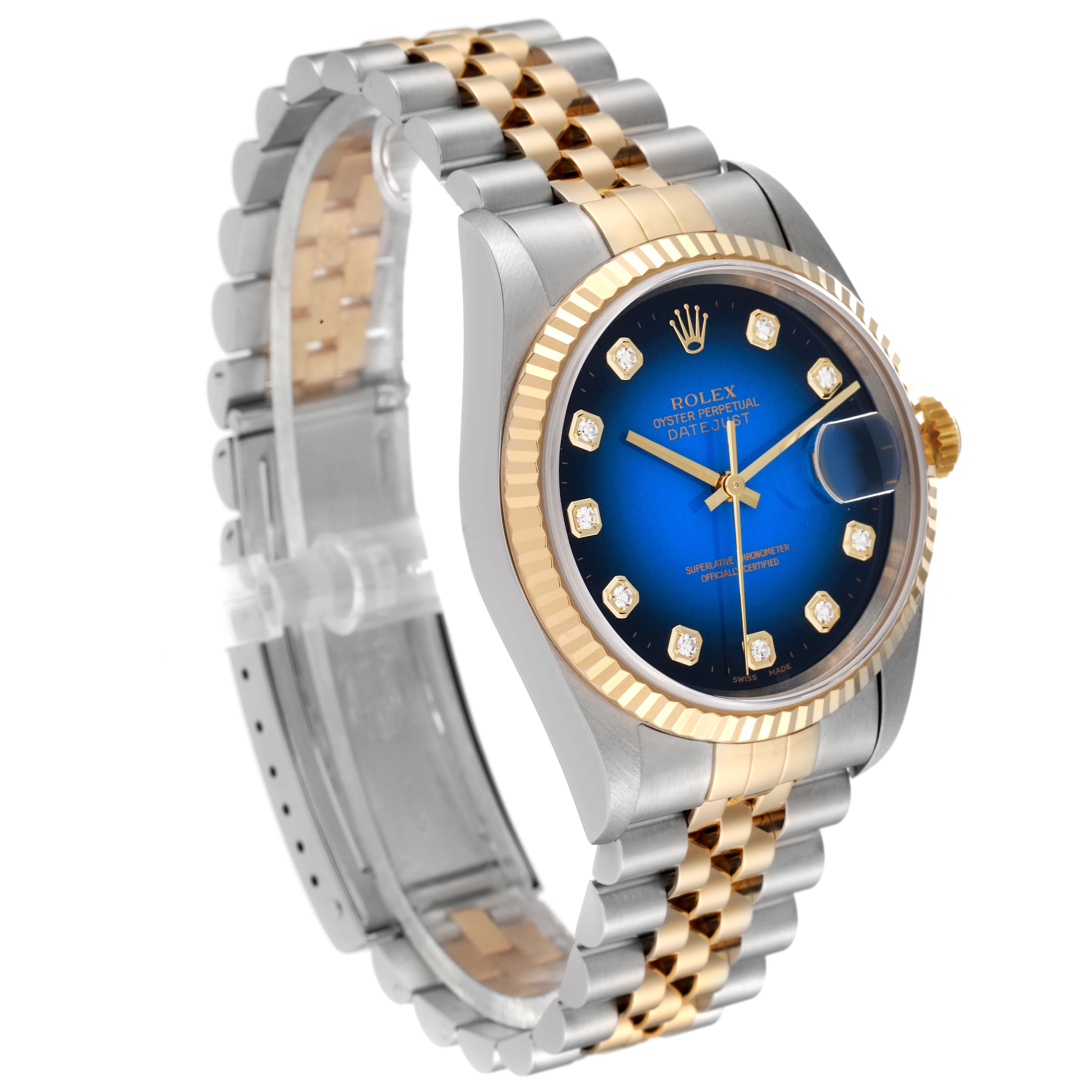 This Rolex Datejust 16233 Men's Steel and Gold (two tone) Blue Dial 16233 Men's Steel and Gold (two tone) Blue Dial model is shown from a three-quarter angle, displaying the dial, fluted bezel, crown, and bracelet.