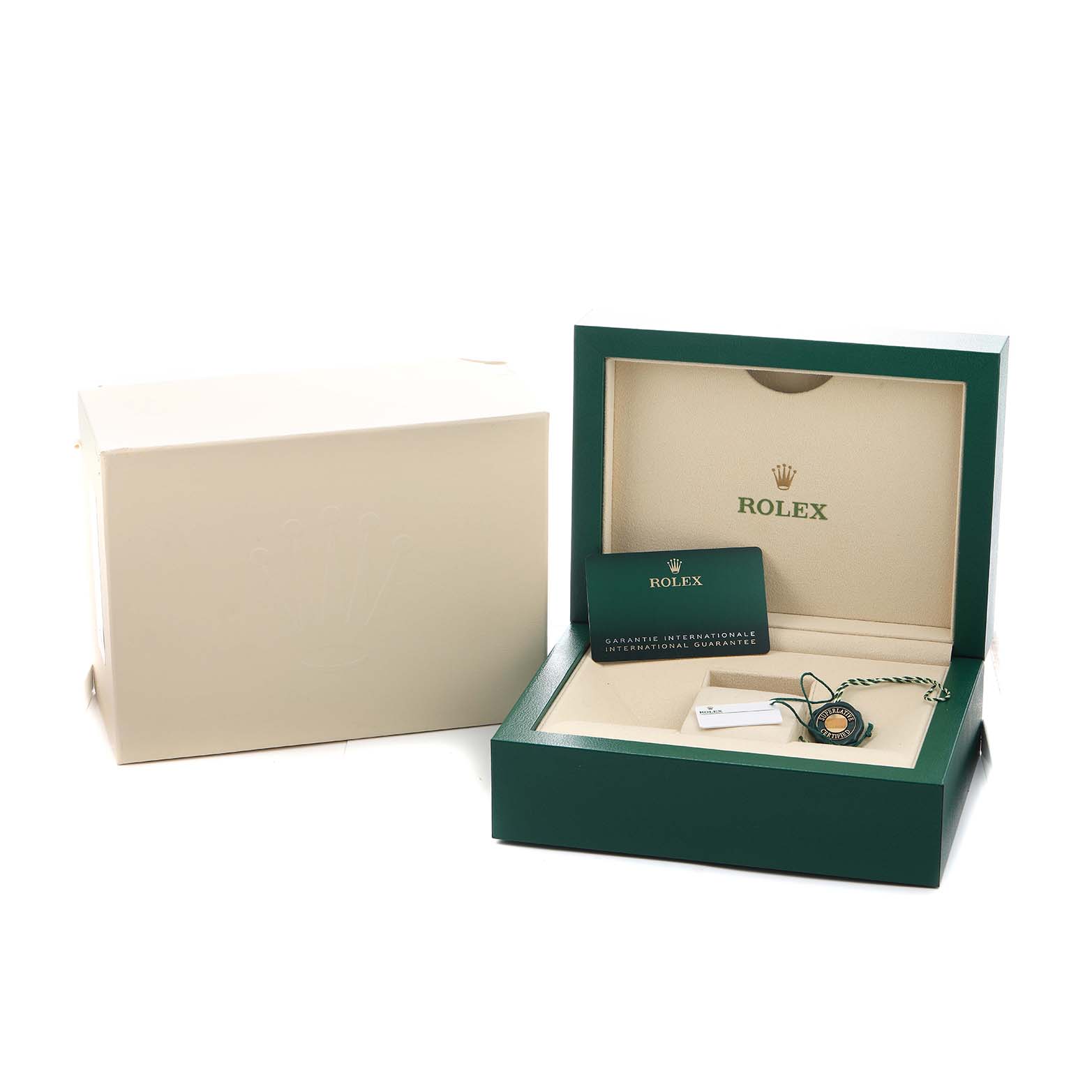 The image shows a Rolex mid-size model box, showcasing its open display with a card and tag accessories.