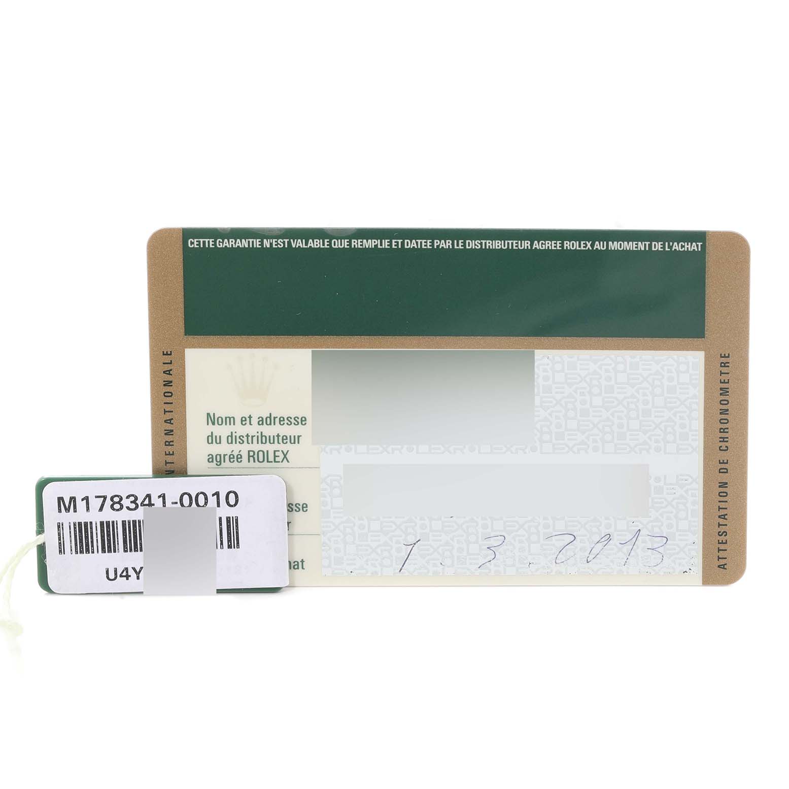 The image shows a warranty card and a barcode tag for a Rolex Mid-Size 178341 Women's Steel and Gold (two tone) Brown Dial 178341 Women's Steel and Gold (two tone) Brown Dial model watch.