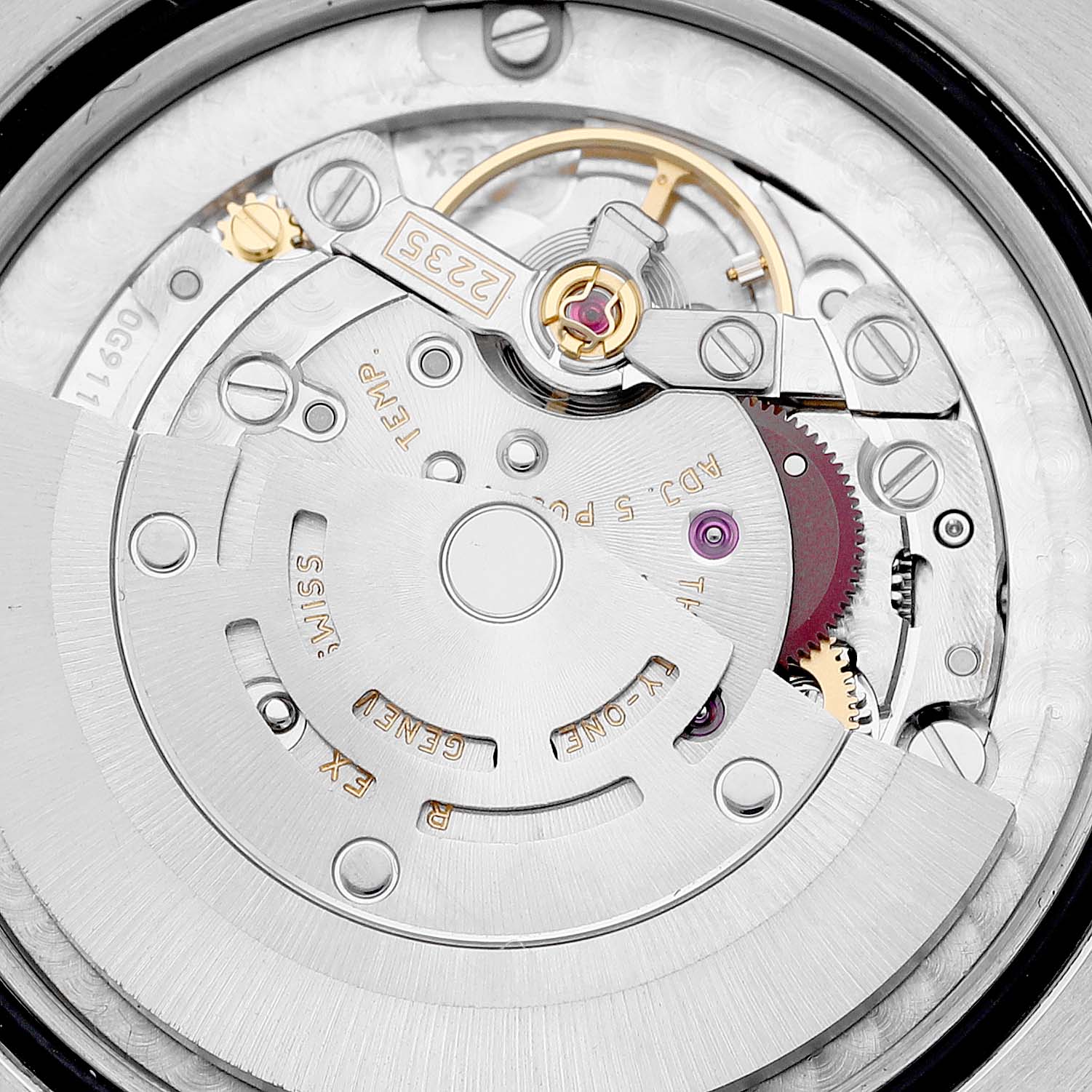 This is a detailed close-up of the Rolex Mid-Size 178341 Women's Steel and Gold (two tone) Brown Dial 178341 Women's Steel and Gold (two tone) Brown Dial watch movement, showing the intricate gears and rotor.