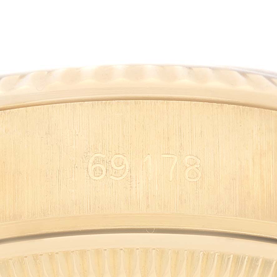 The image shows a close-up of the case side and bezel edge of a Rolex President 69178 Women's Yellow Gold Champagne Dial 69178 Women's Yellow Gold Champagne Dial model, with the serial number 69178 engraved.