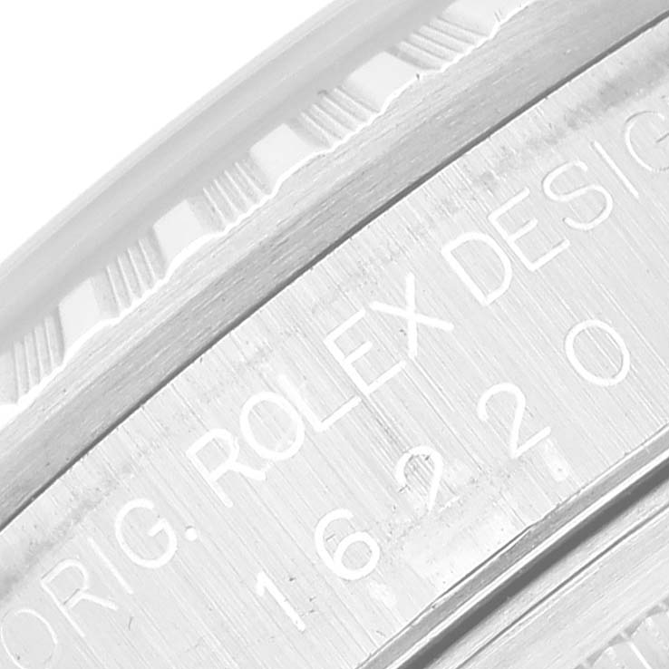 This is a close-up of the engraved case back of a Rolex Datejust 16220 Men's Stainless Steel Silver Dial 16220 Men's Stainless Steel Silver Dial watch, showing the model number and "Rolex Design" inscription.
