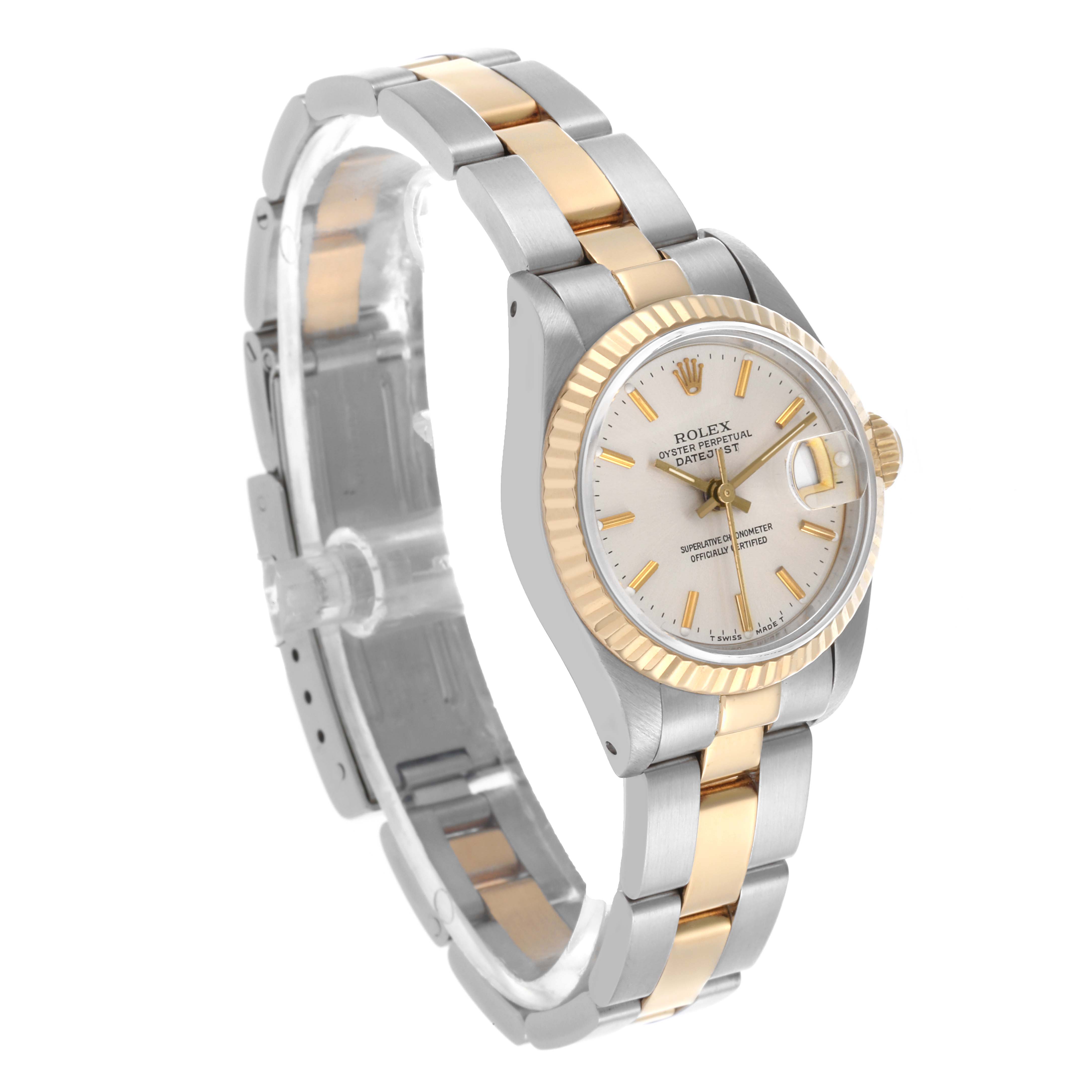 The Rolex Datejust 69173 Women's Steel and Gold (two tone) Silver Dial 69173 Women's Steel and Gold (two tone) Silver Dial watch is shown at a three-quarter angle, highlighting its two-tone bracelet and fluted bezel.